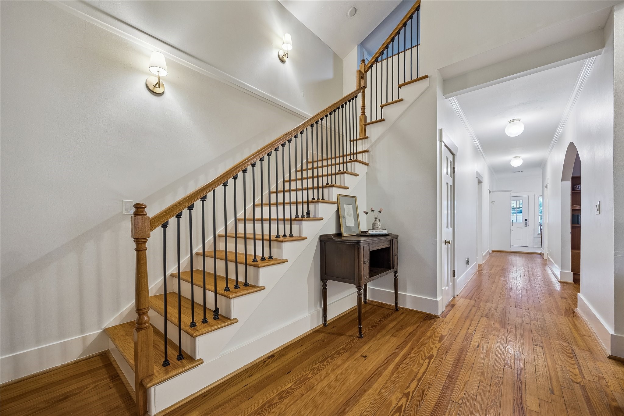 Stairs from the living room up to the loft space.