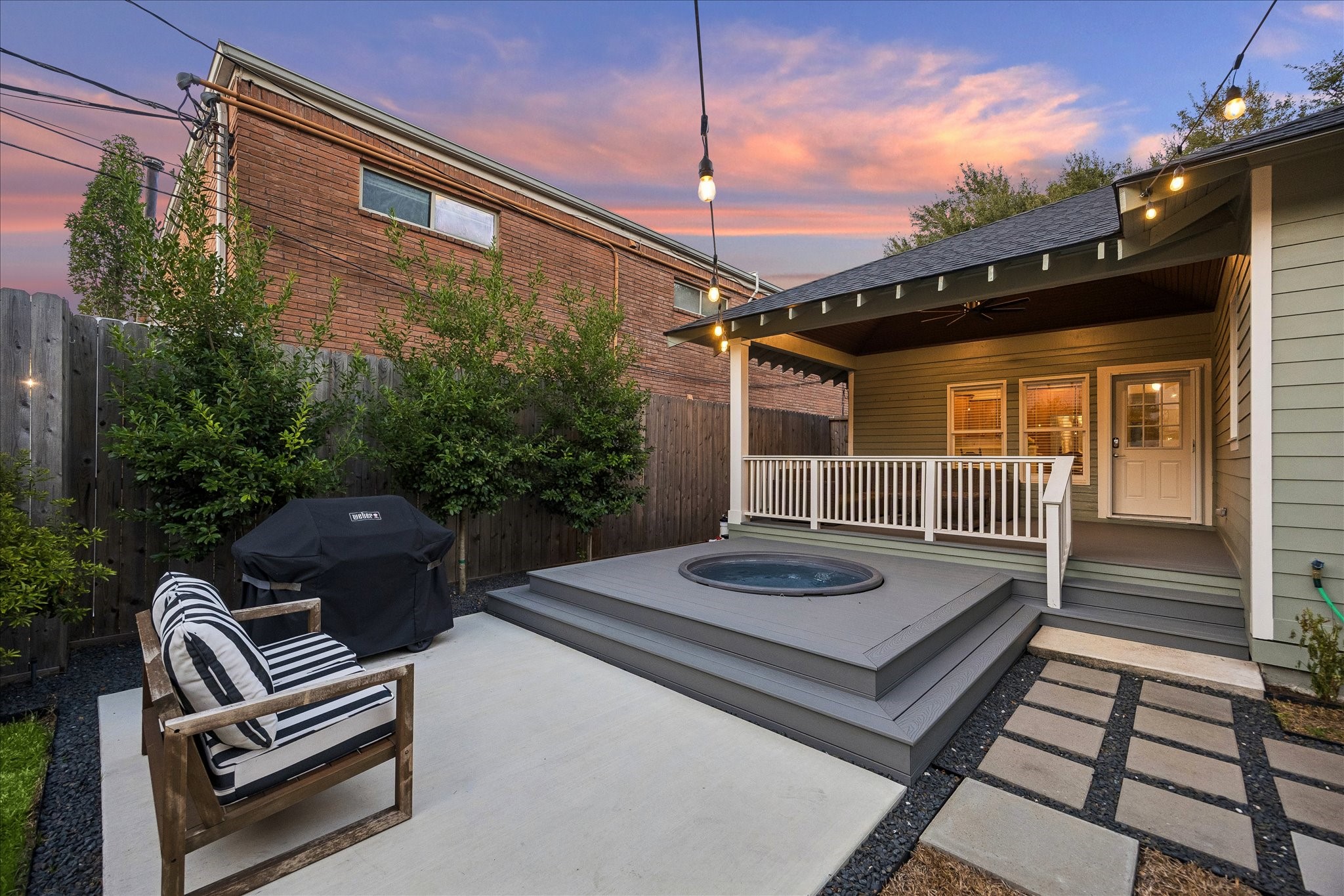 Another view of the extended back patio & porch area.