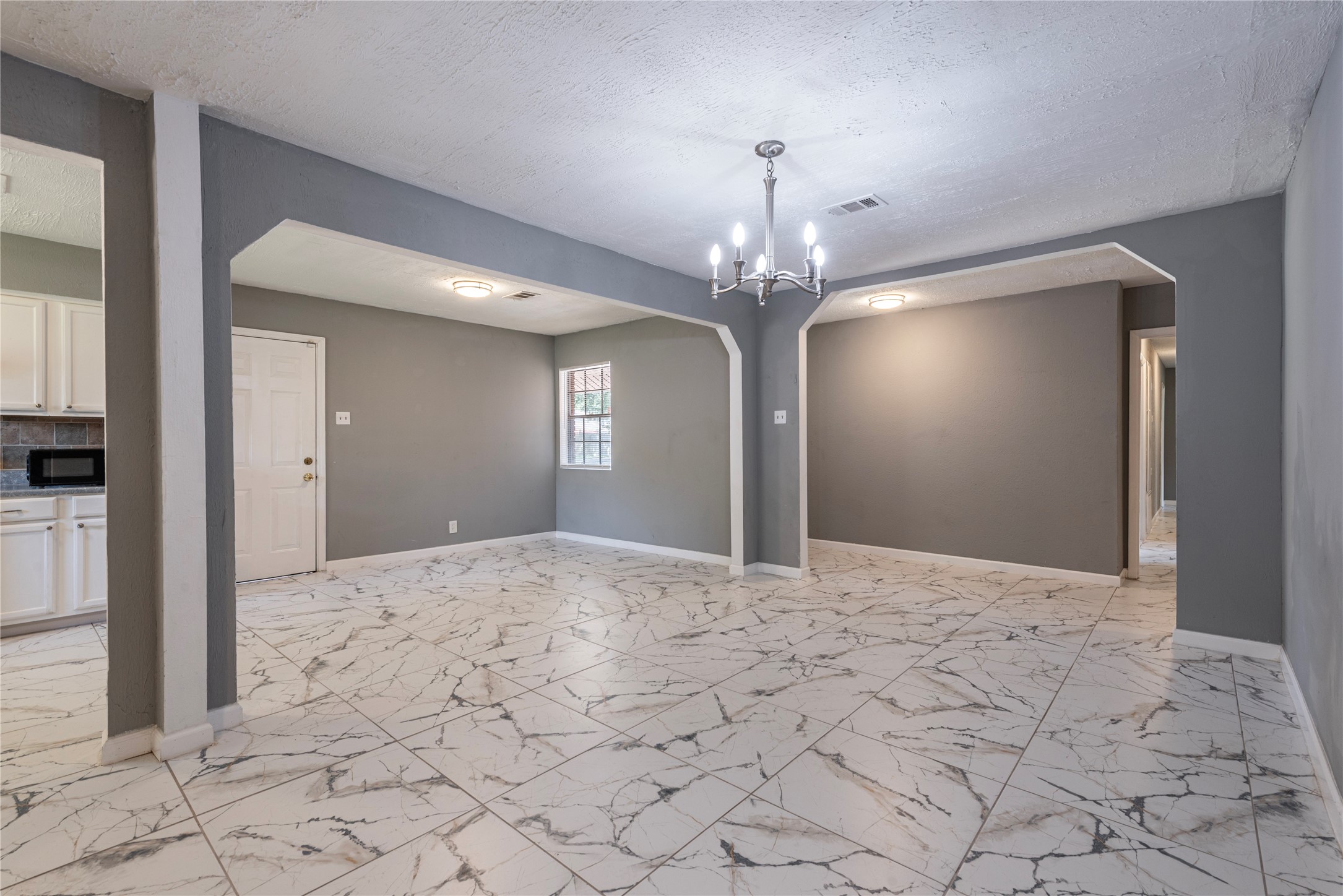 Large dining room with easy access to the kitchen