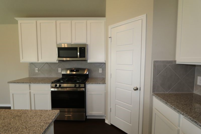 Granite countertops and island with sink Granite countertops and island with sink
