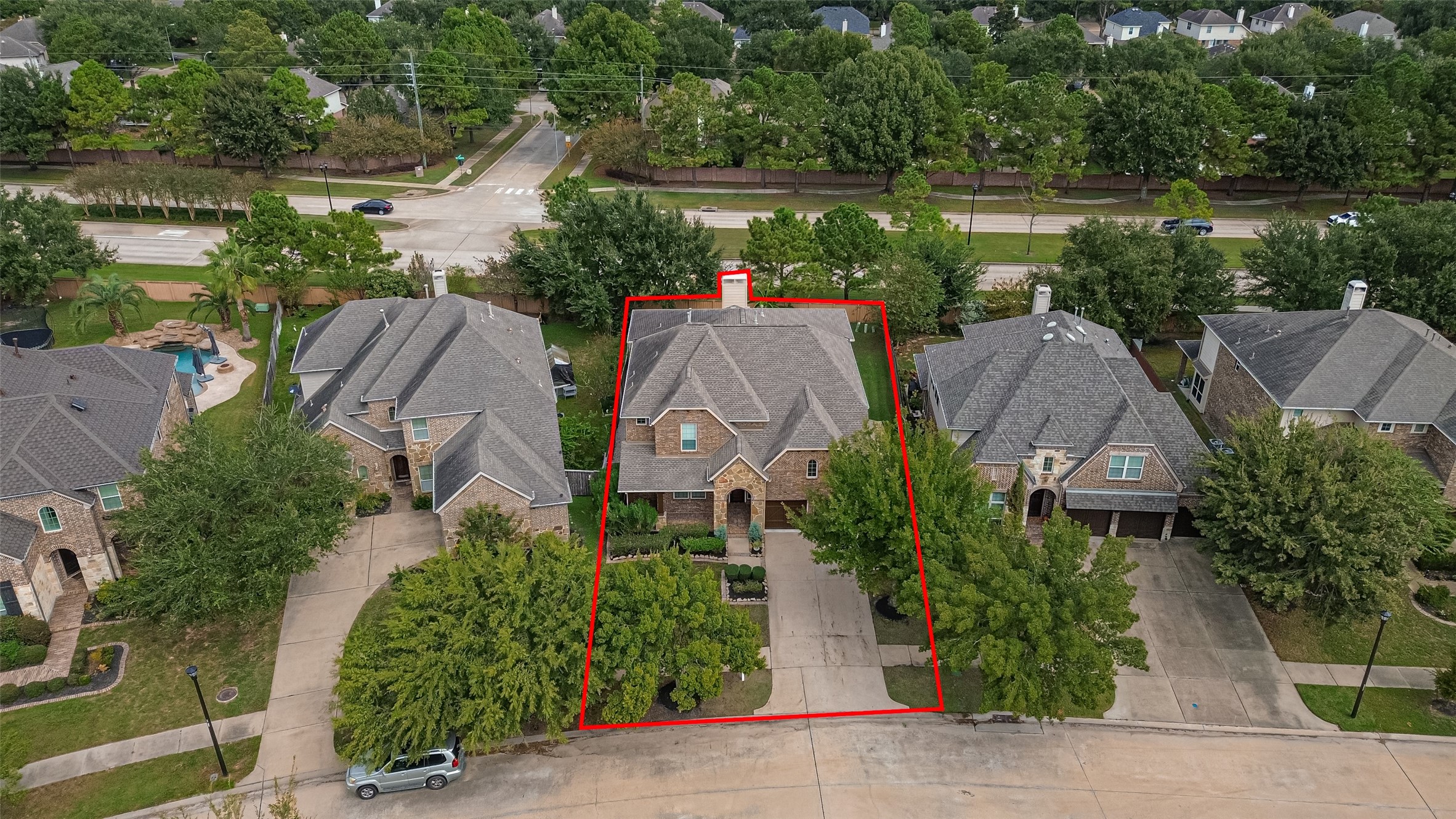 Aerial view of the home and surrounding area