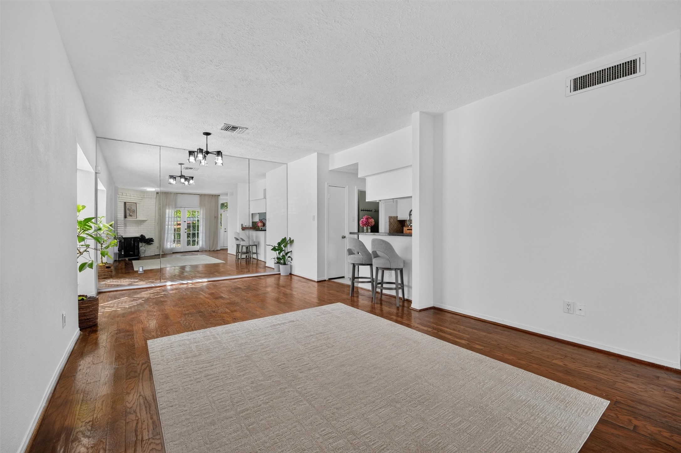 Unstaged reverse view of the living room, offering a clear look at the room's layout.