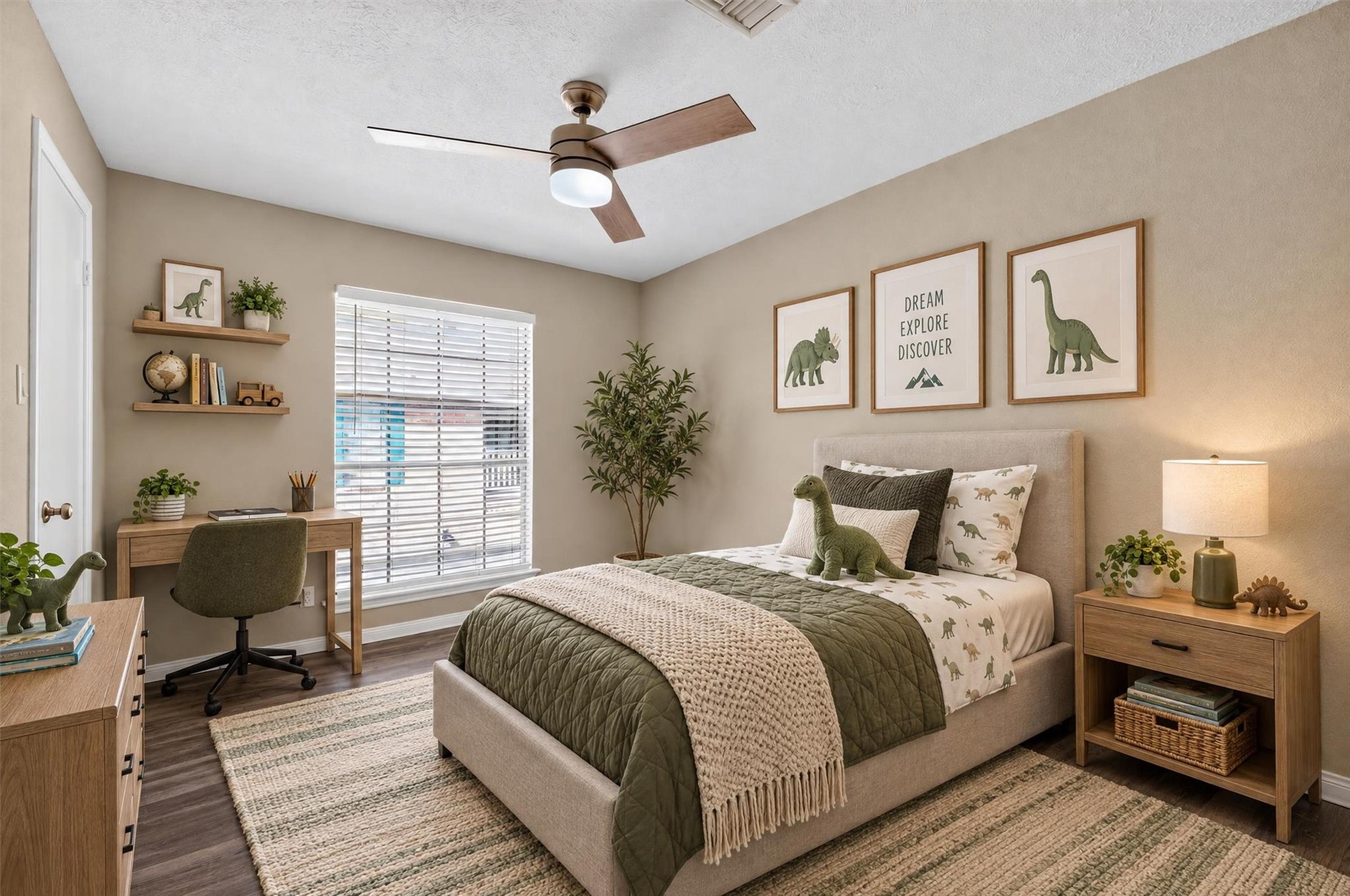 Secondary bedroom with natural light and space for a desk or reading nook. Virtually staged.