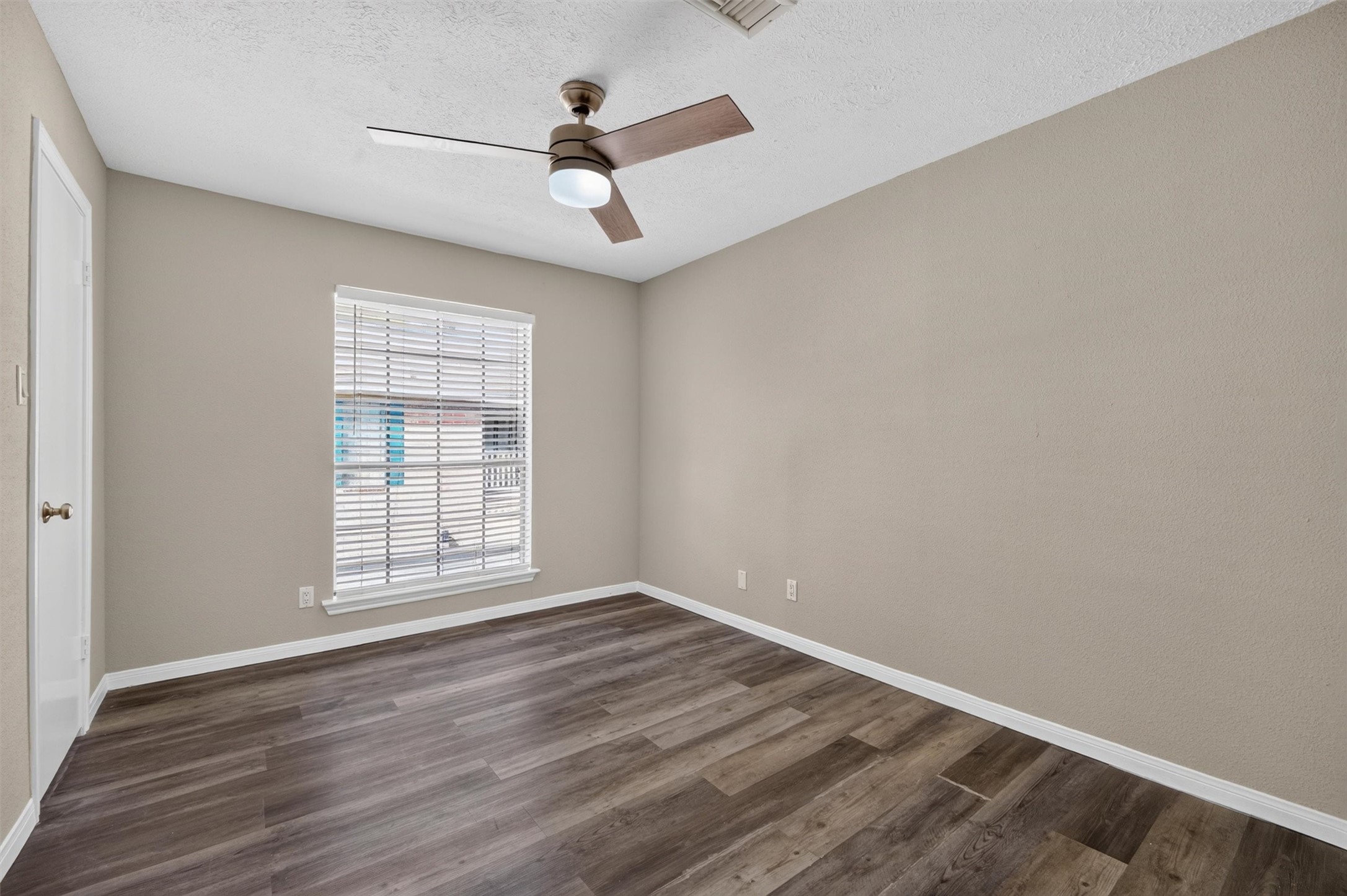 Additional bedroom offering flexible space for guests or everyday living. Virtually staged.