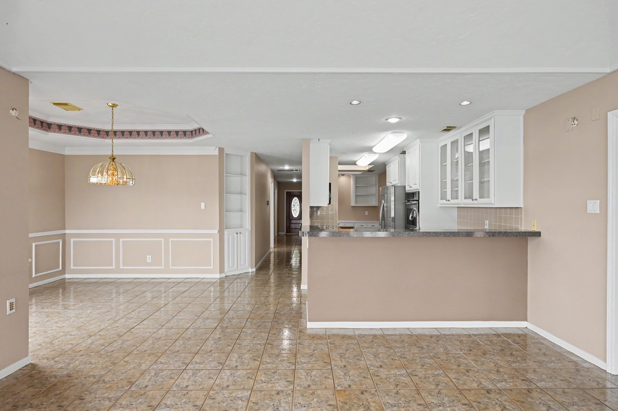 Additional view from the Living Area of the Dining & Kitchen Areas.