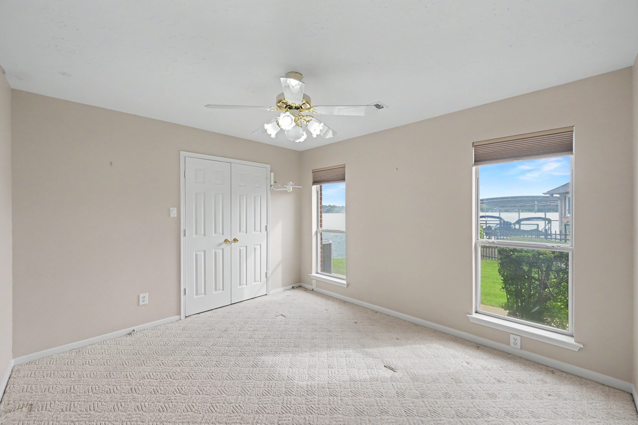 Second Guest Bedroom with water views and generous closet. Second Guest Bedroom with water views and generous closet.
