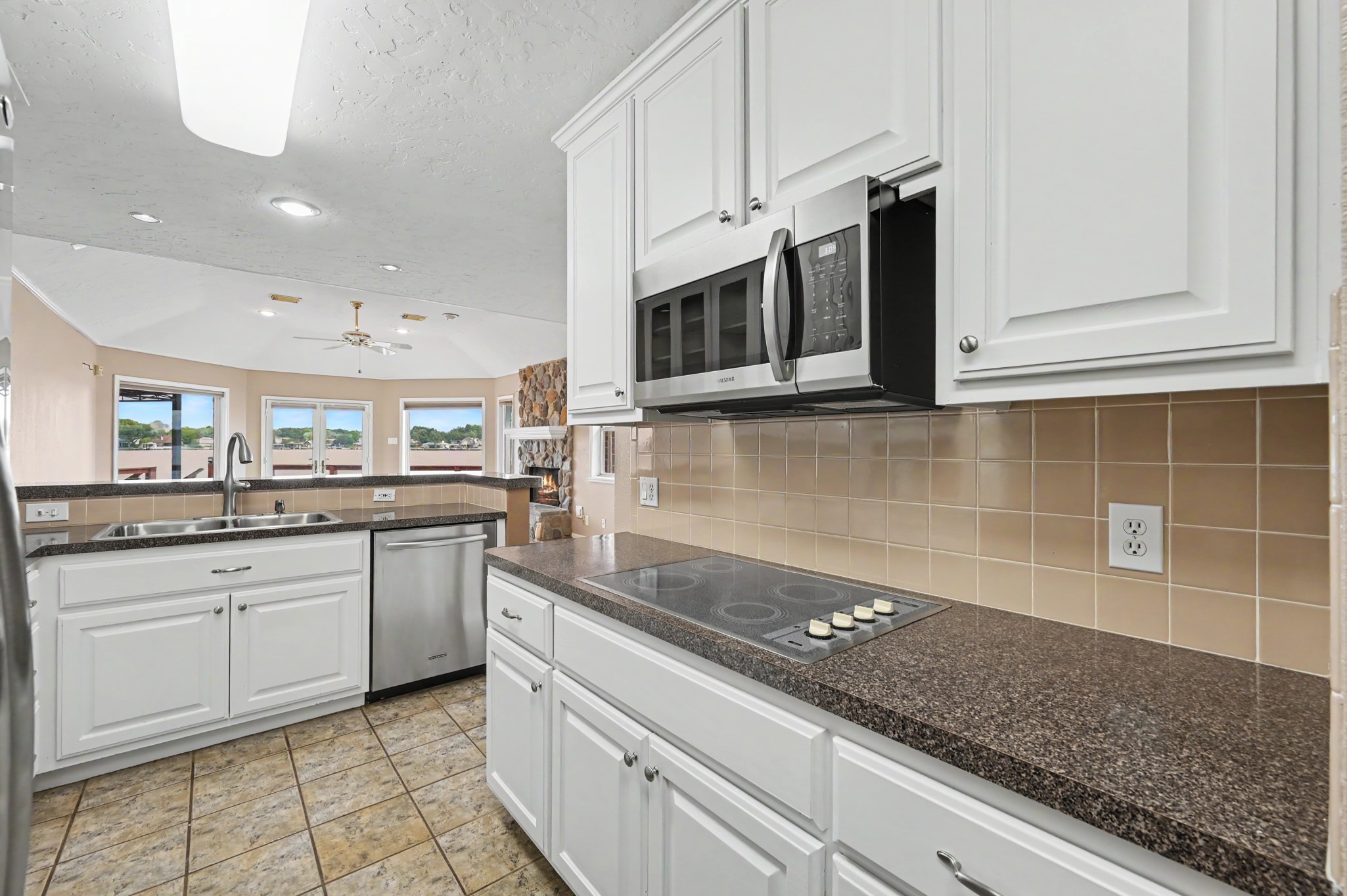 Cooktop and built-in microwave.