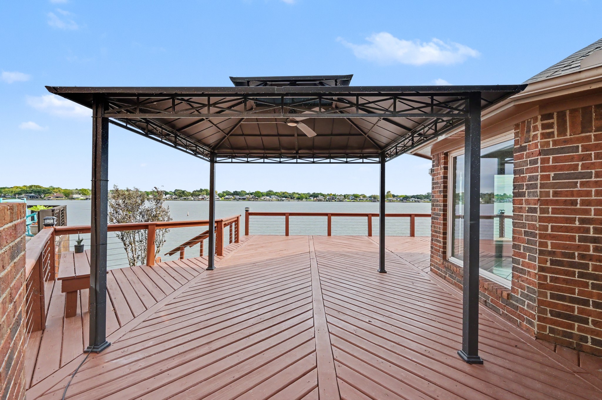 View of the deck from the Primary Suite French doors.