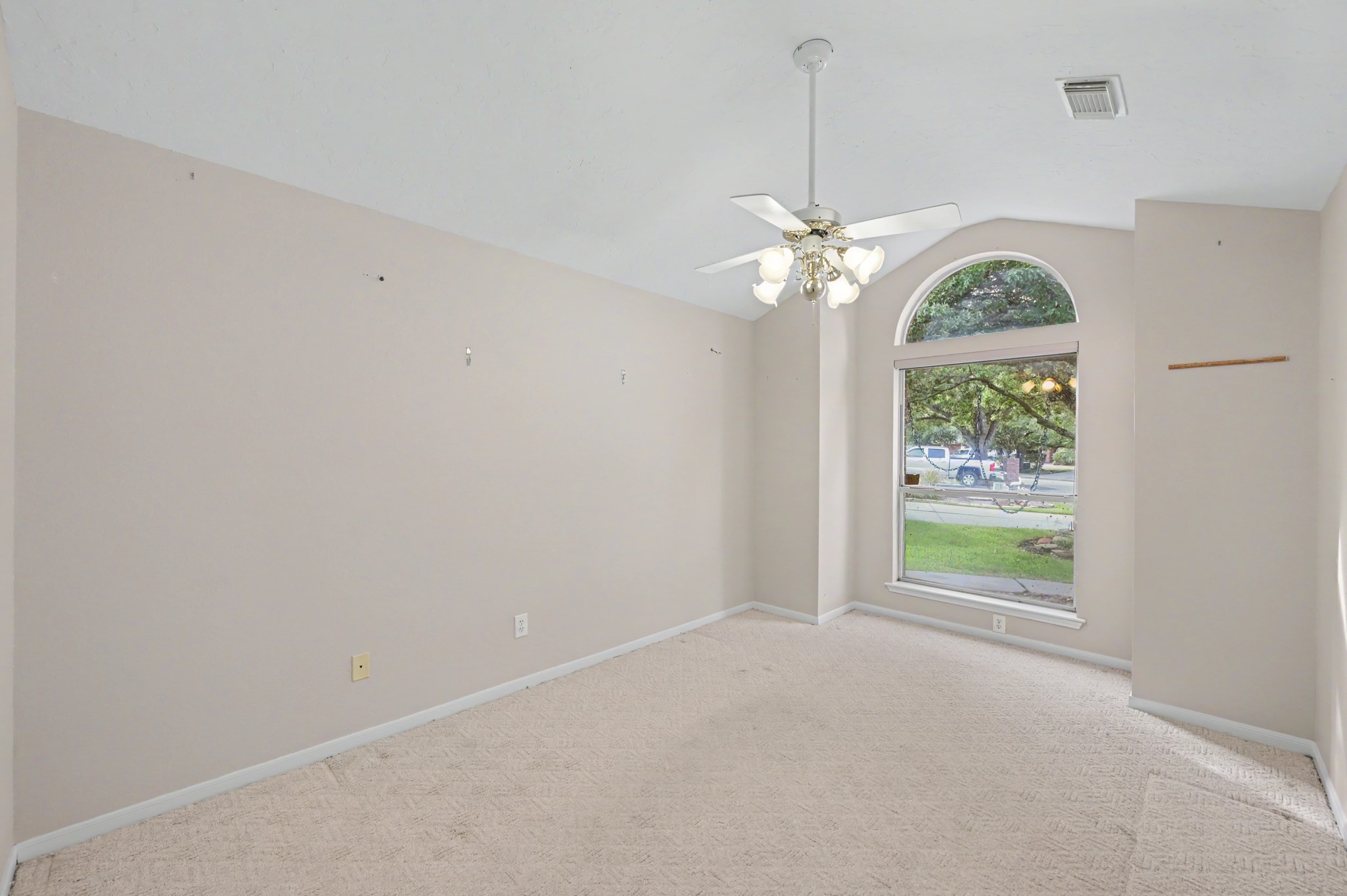 Front Guest Bedroom with views of the front yard. Front Guest Bedroom with views of the front yard.