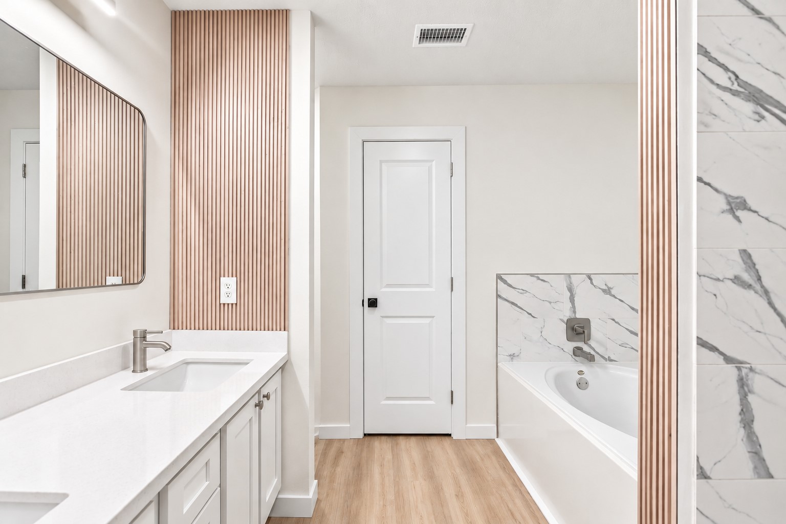 The primary bathroom has double sinks