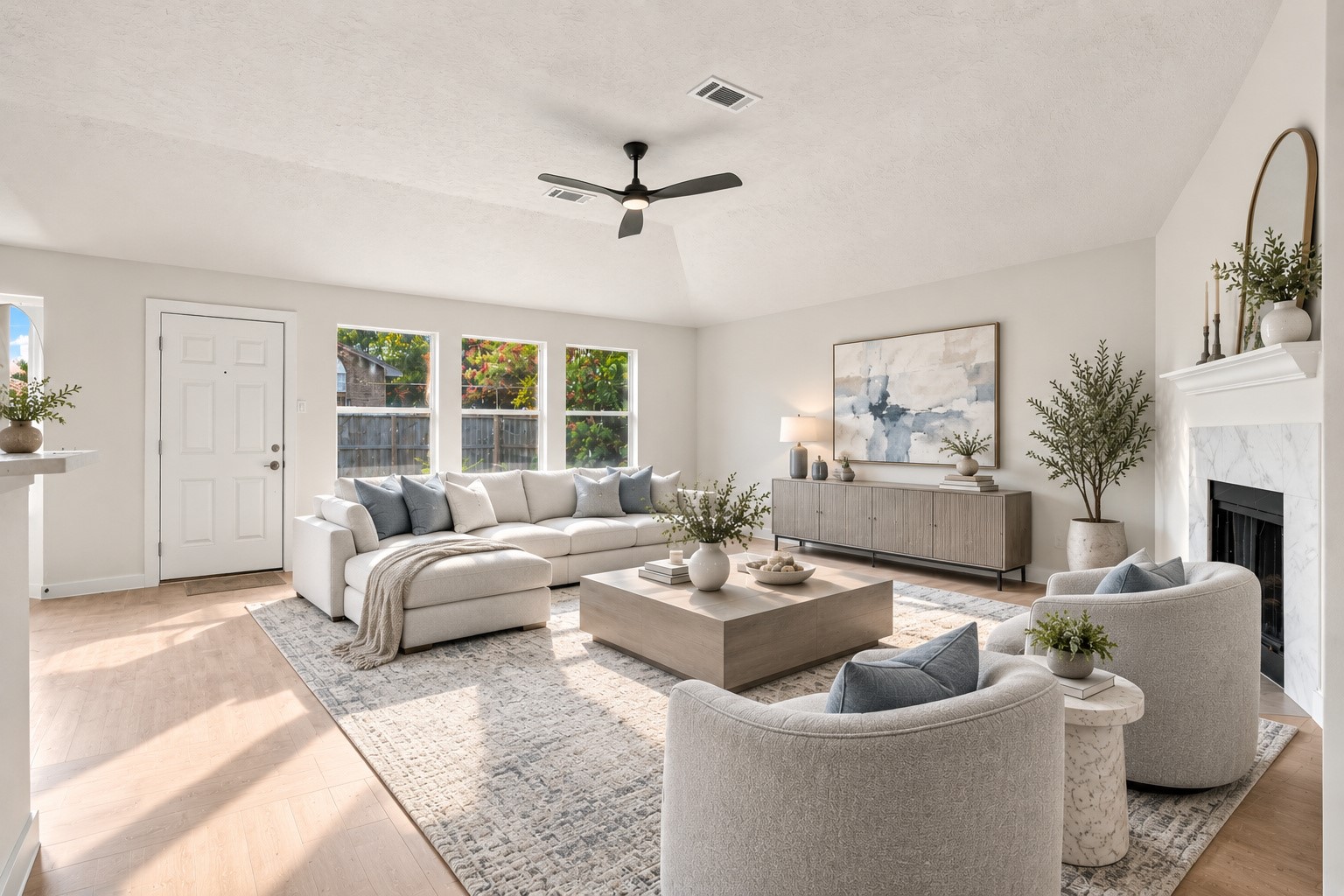 The living room opens up into the kitchen and additional dinning area