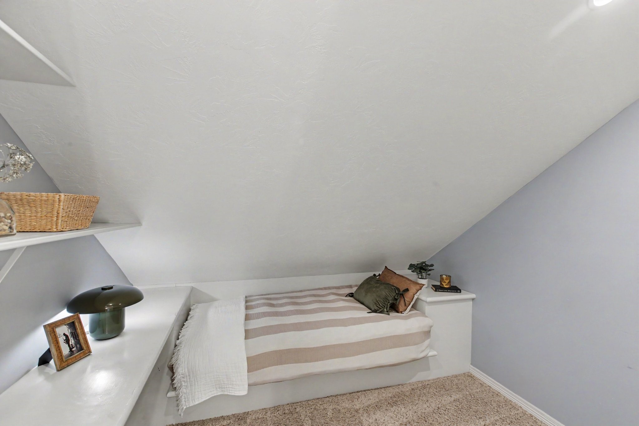 This closet is awesome and has hidden storage! It's a play room and bunk room in one with shelves for books, toys and games. The bunk can be used for overnight guests or for fun movie nights if someone else is using the separate media room. The closet space not shown is on the other side of this room.