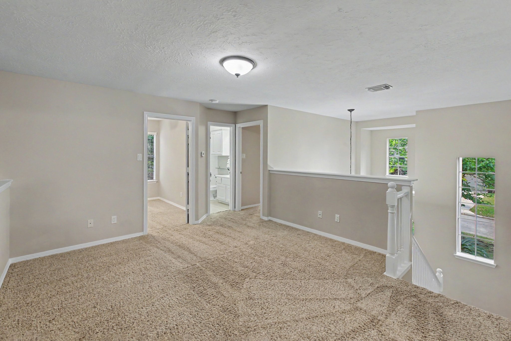 When you take a stroll upstairs, you are greeted by the vast game room which branches off to three bedrooms, a full bathroom, and a media room.