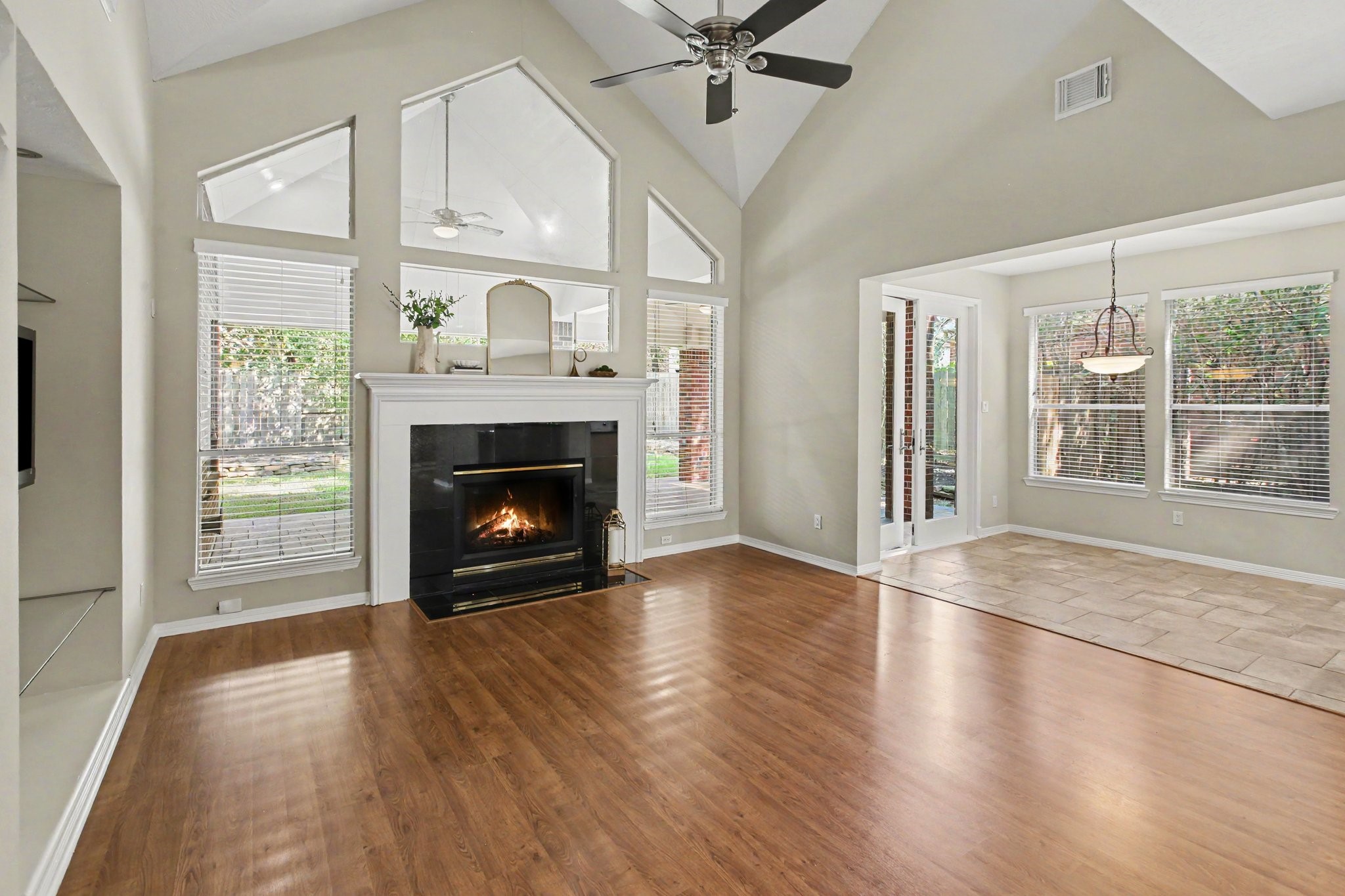 The cozy breakfast nook with outdoor views and access to the sprawling covered patio and manicured backyard.