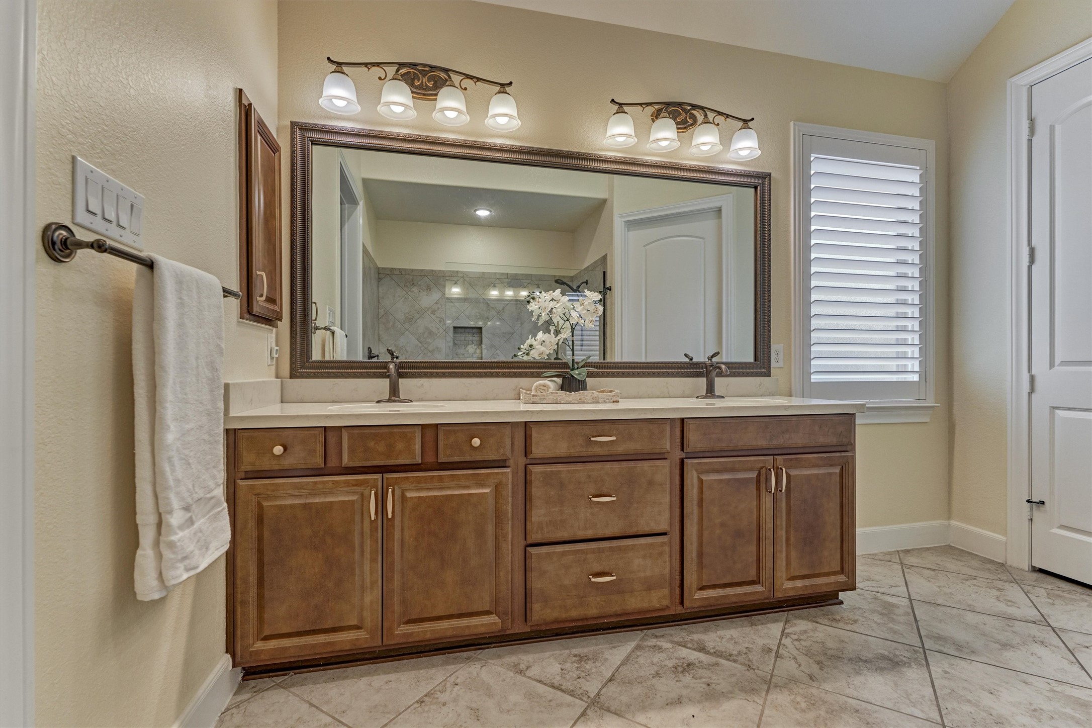 Featuring dual vanities and fine appointments throughout.