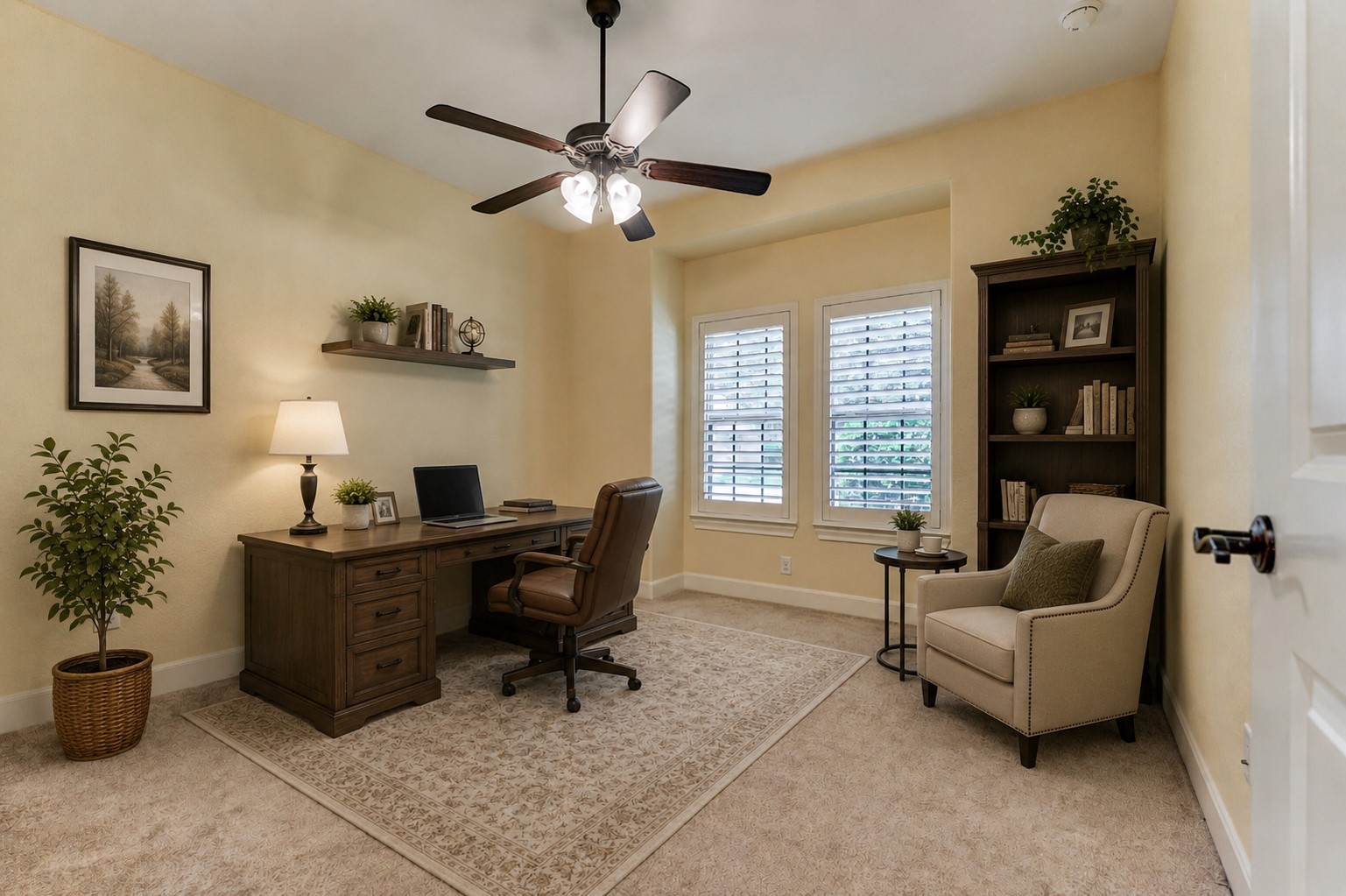 *This photo is virtually staged* Secondary bedroom #1 is spacious and features plush carpeting, ceiling fan and closet. Could be an optional home office!