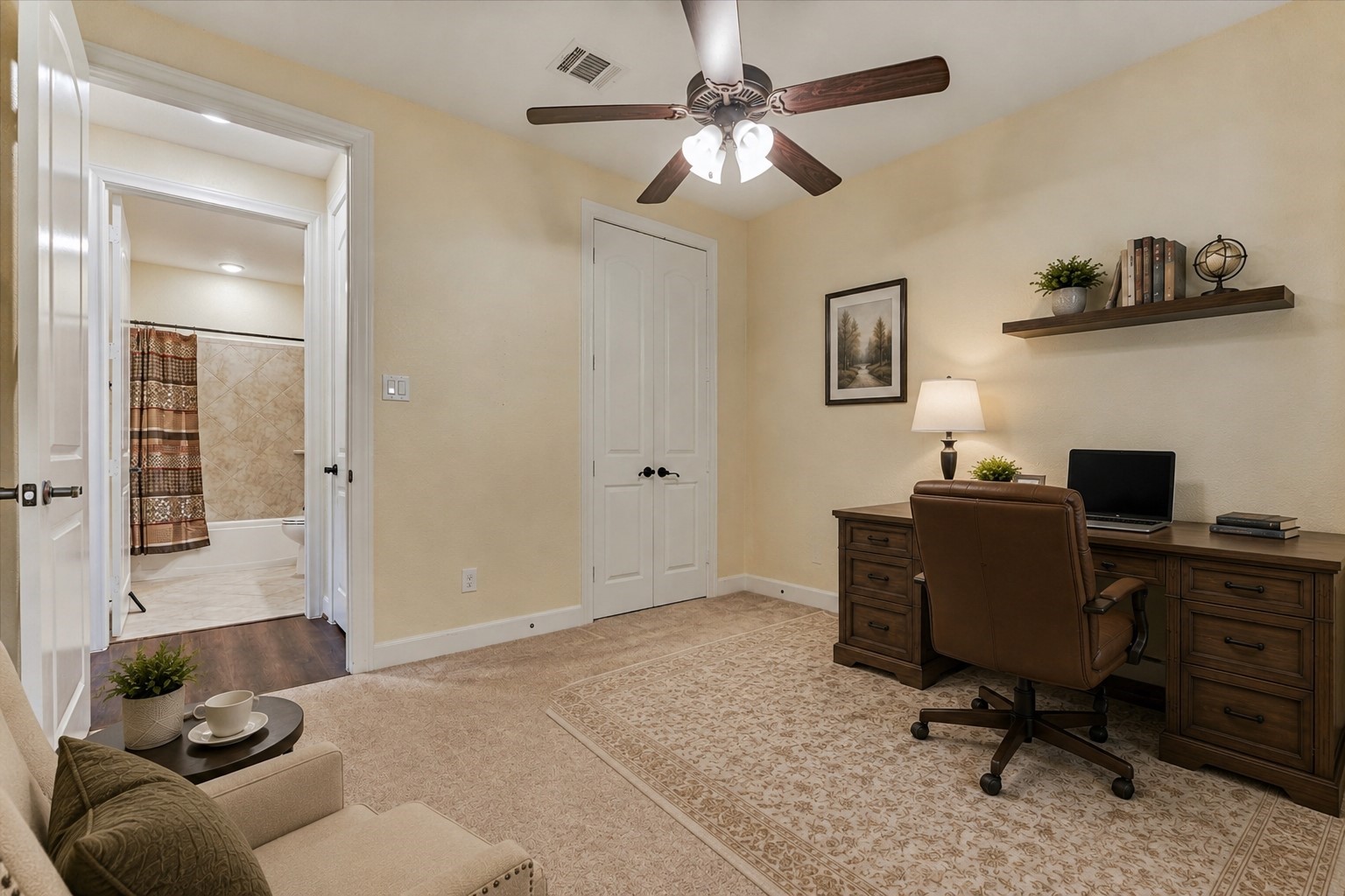 *This photo is virtually staged* Secondary bedroom #1 with double doors to the closet.