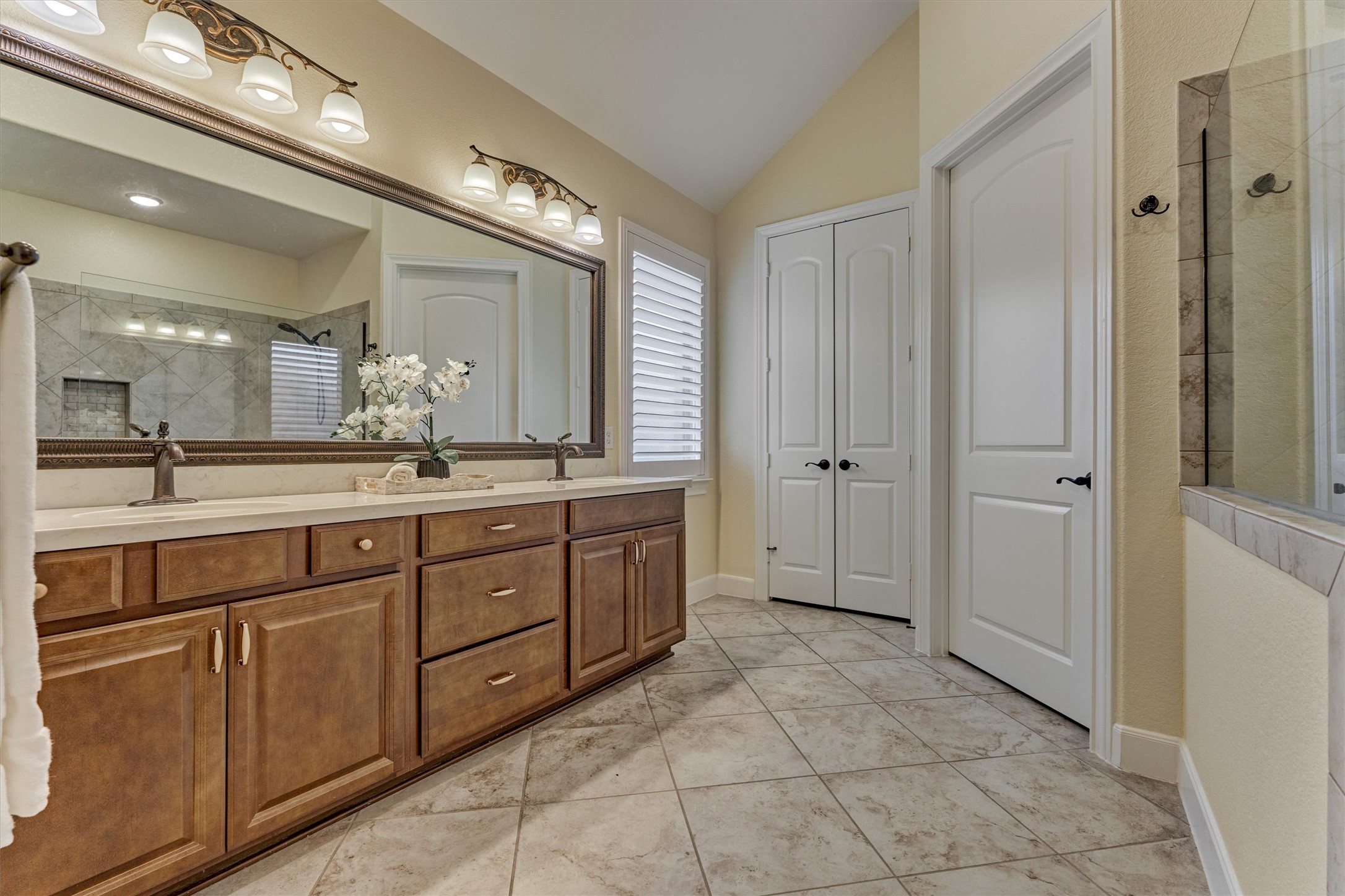 Spa-like primary bathroom has been immaculately maintained!