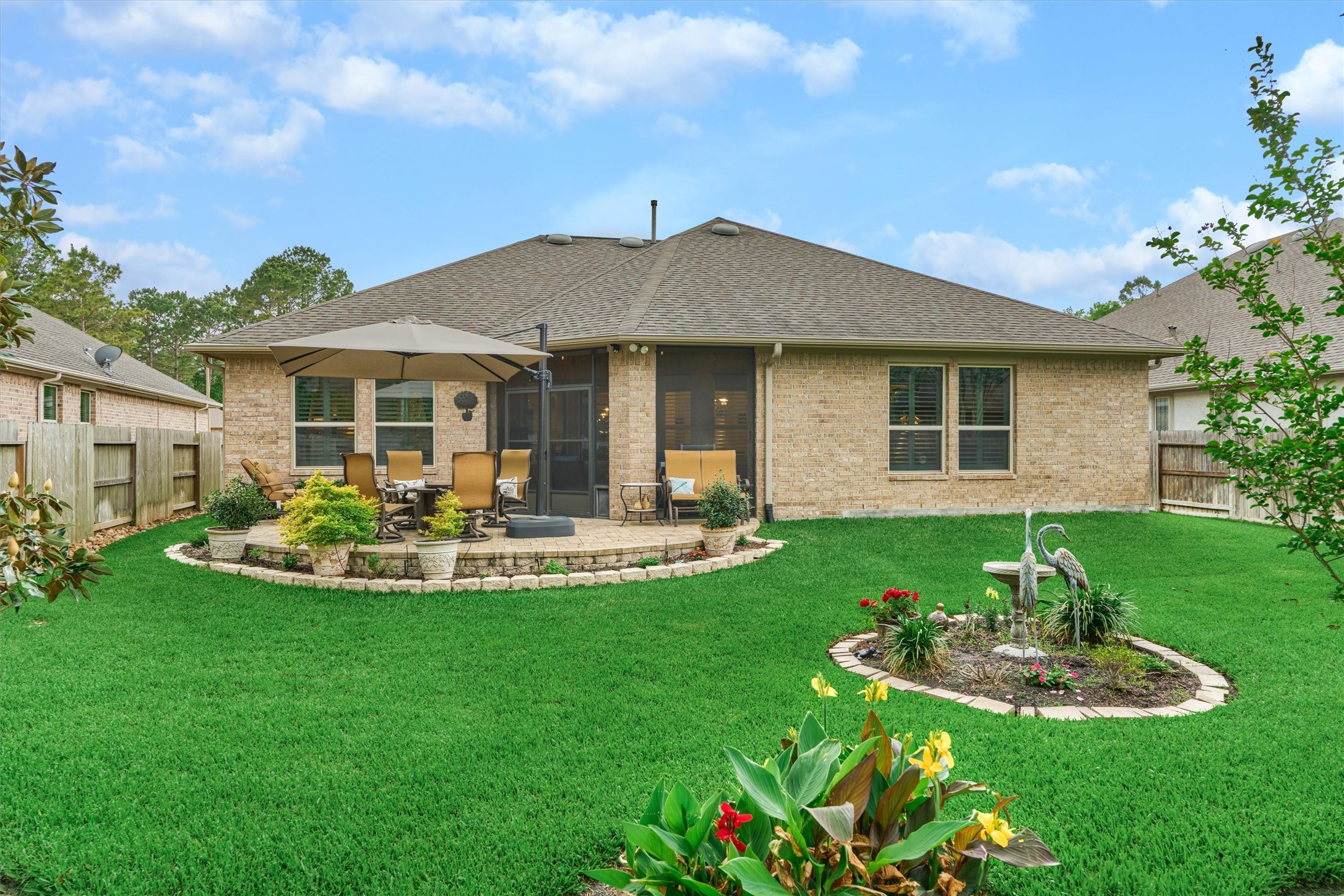 Vibrant landscaping makes this exquisite backyard oasis the ultimate peaceful retreat! Vibrant landscaping makes this exquisite backyard oasis the ultimate peaceful retreat!