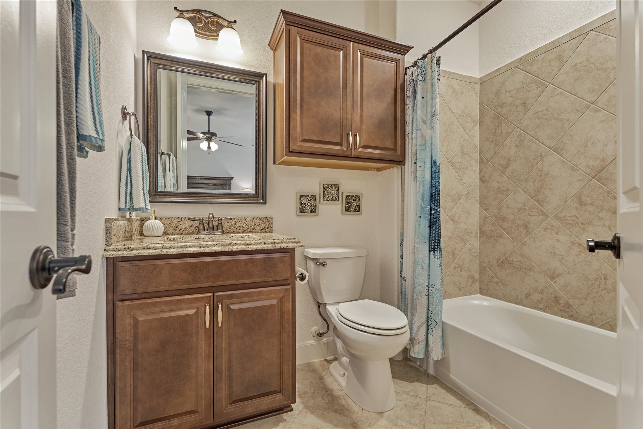 Full bathroom with tub/shower combo for secondary bedroom #2.
