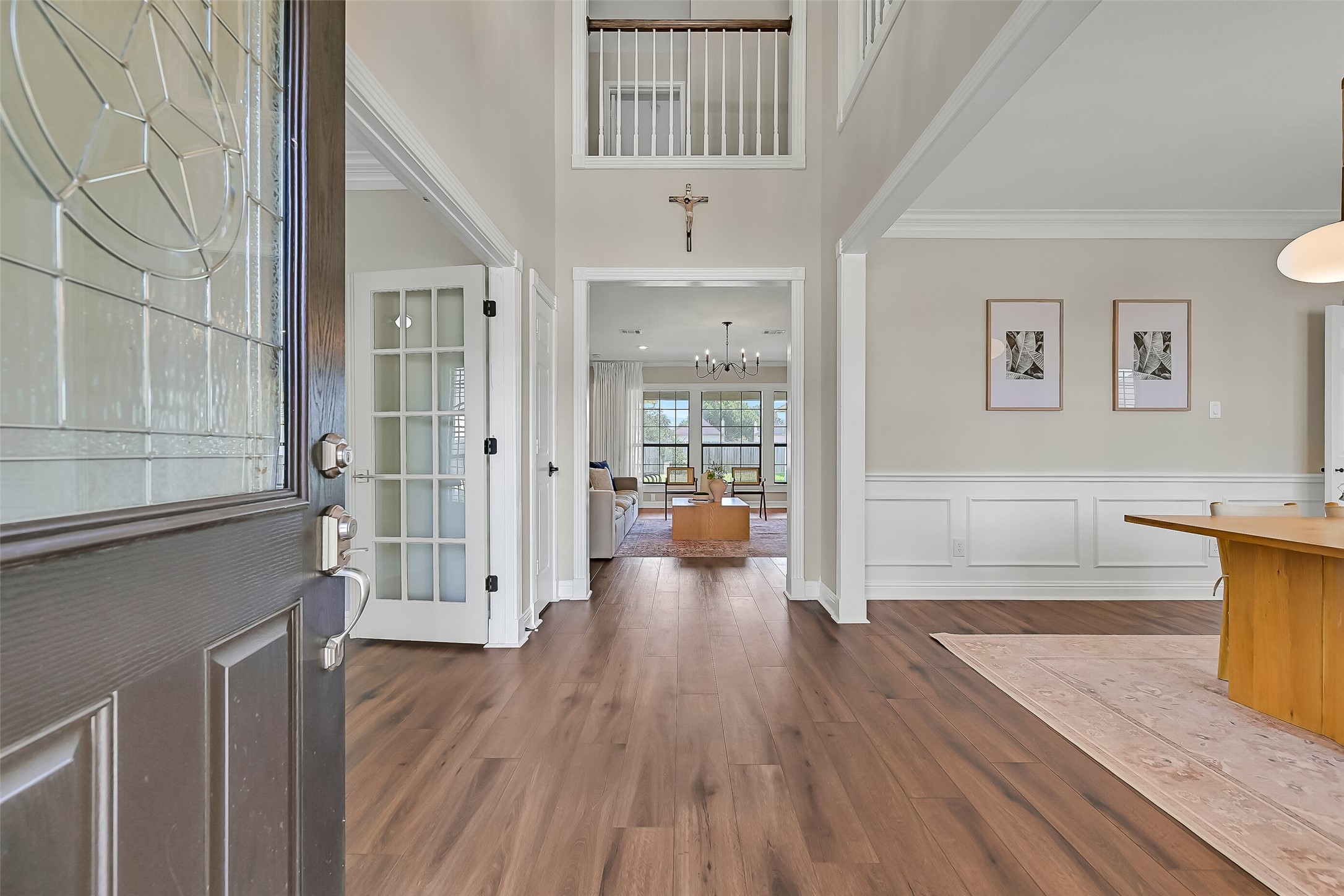Step inside to a light-filled 2-story foyer with luxury vinyl plank flooring, neutral finishes, crown molding & an open staircase. Sightlines extend into the family room, while the formal dining room and private study are conveniently positioned just off the entry.