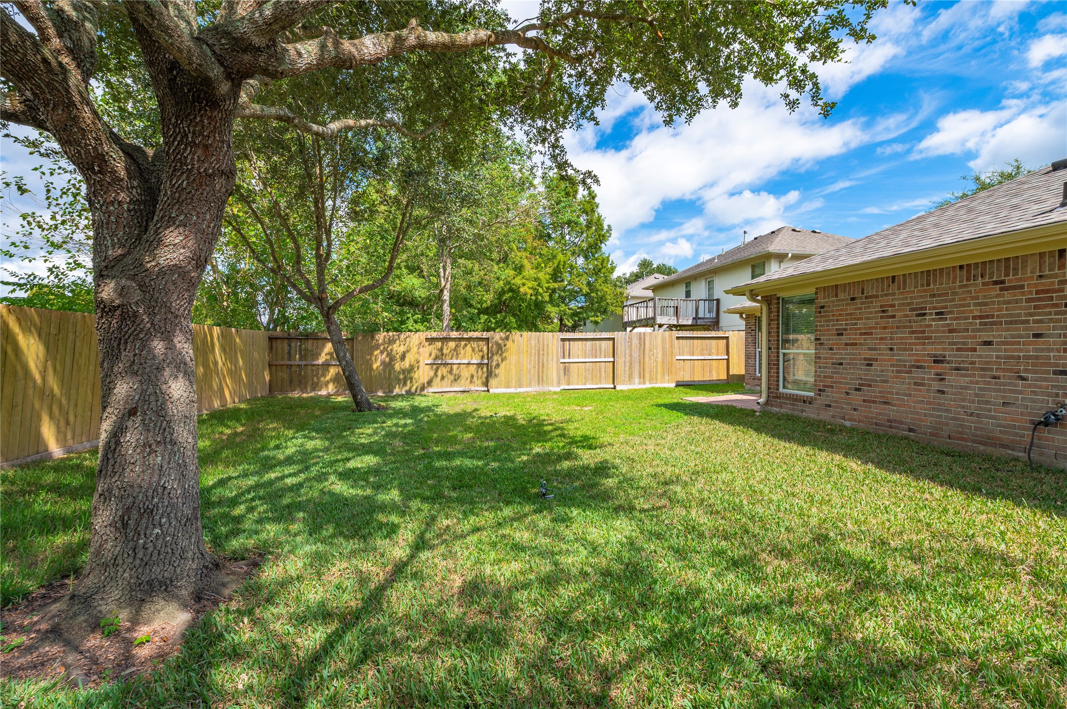 Additional view of the large backyard.