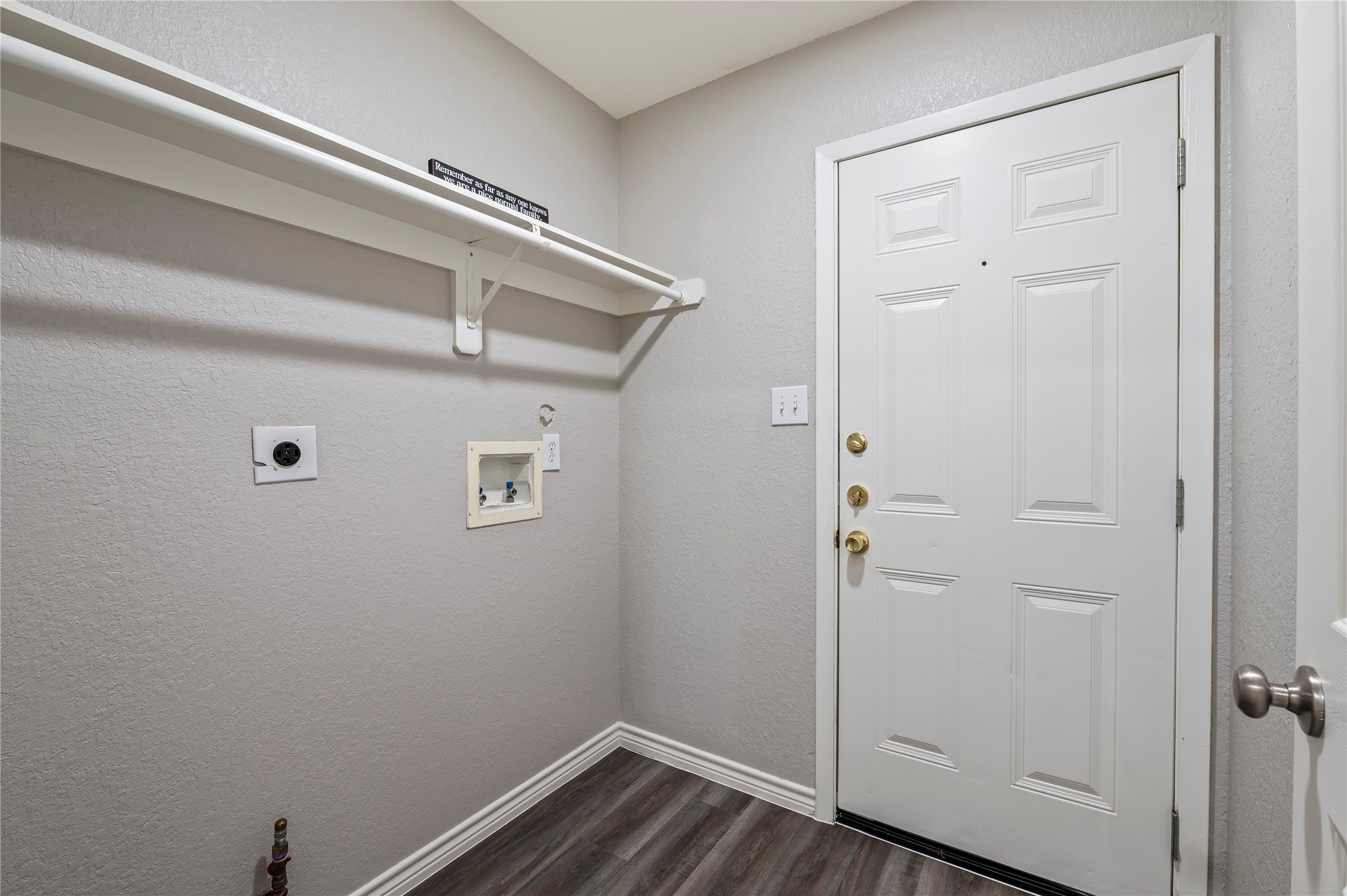Utility room in house with garage access.