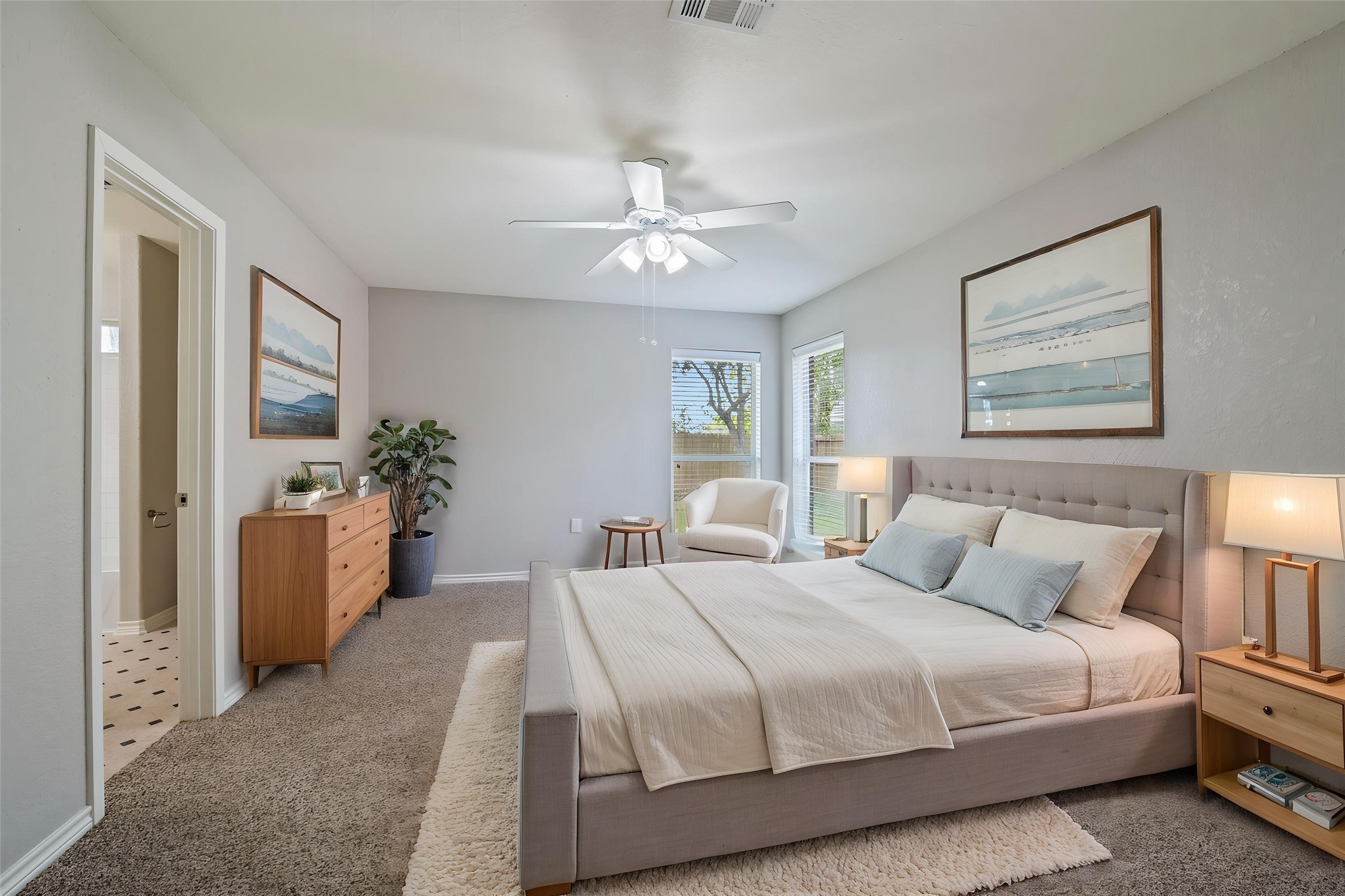 Primary bedroom is very spacious with backyard views. Virtually staged.