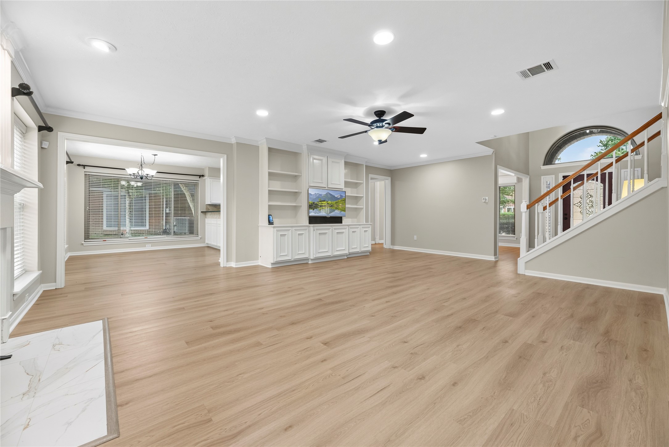 Open, airy & ready for real life, this spacious living room gives everyone room to spread out, settle in & simply enjoy the comforts of home. Updated LVP flooring throughout the 1st floor in October 2025 adds a fresh, polished finish. Open, airy & ready for real life, this spacious living room gives everyone room to spread out, settle in & simply enjoy the comforts of home. Updated LVP flooring throughout the 1st floor in October 2025 adds a fresh, polished finish.