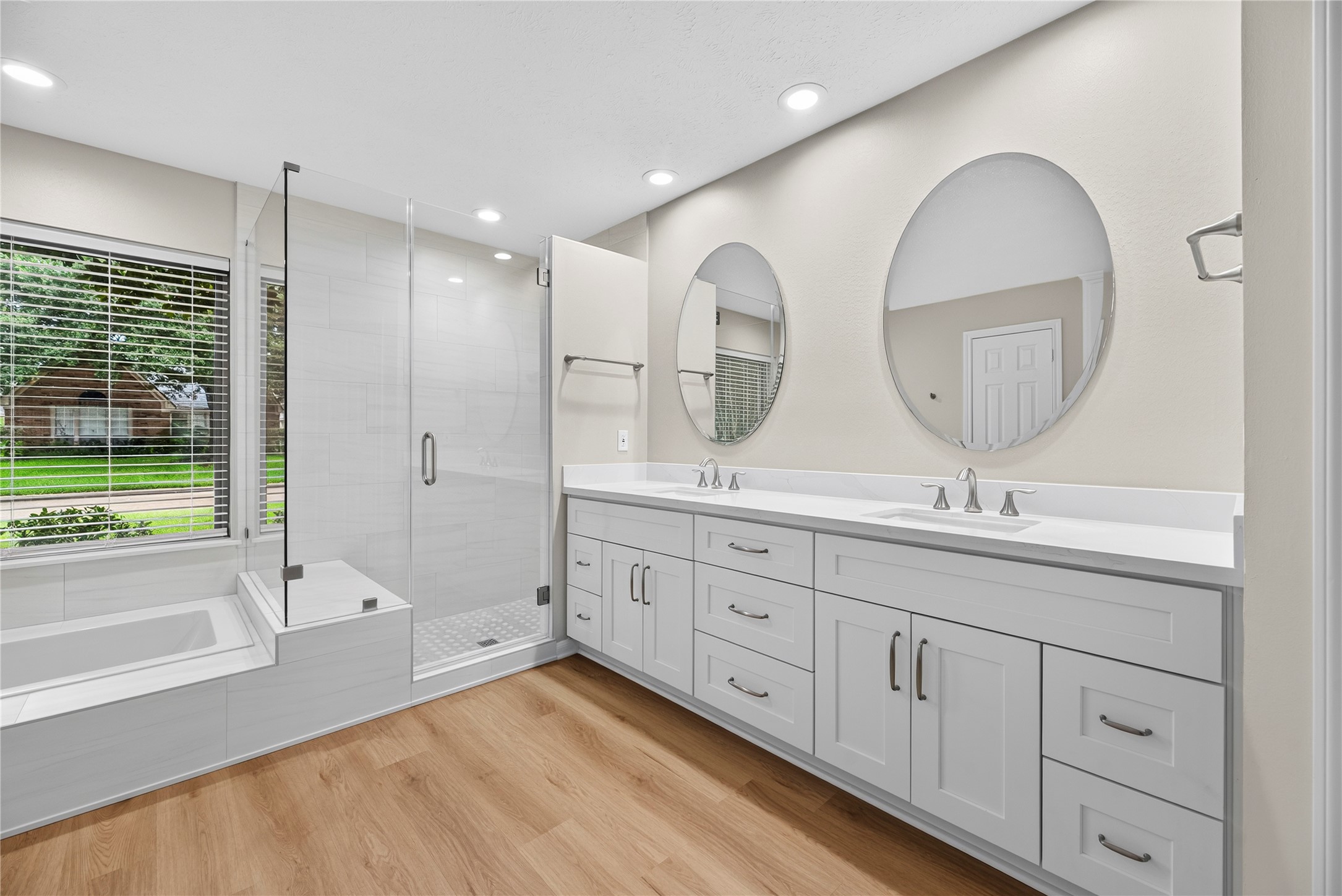 The dual-sink vanity offers extensive storage, stylish mirrors and plenty of room to get ready, while 2 of the owners retreats 3 walk-in closets keep clothing, shoes and accessories beautifully organized.