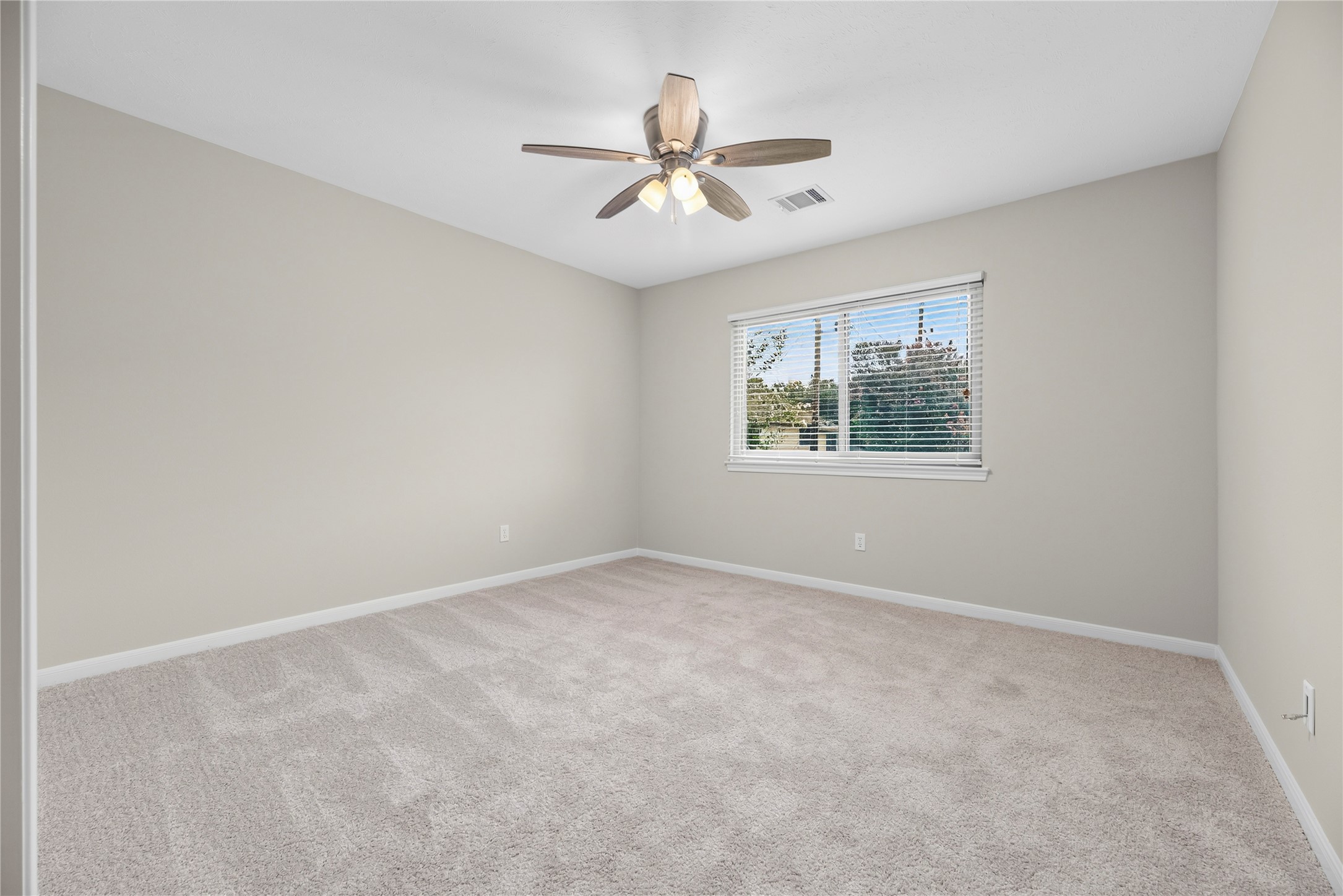 This flexible upstairs room with a nearby walk-in closet is ready to work around your lifestyle, whether you need a quiet home office or gym, a creative studio or a comfortable 5th bedroom.