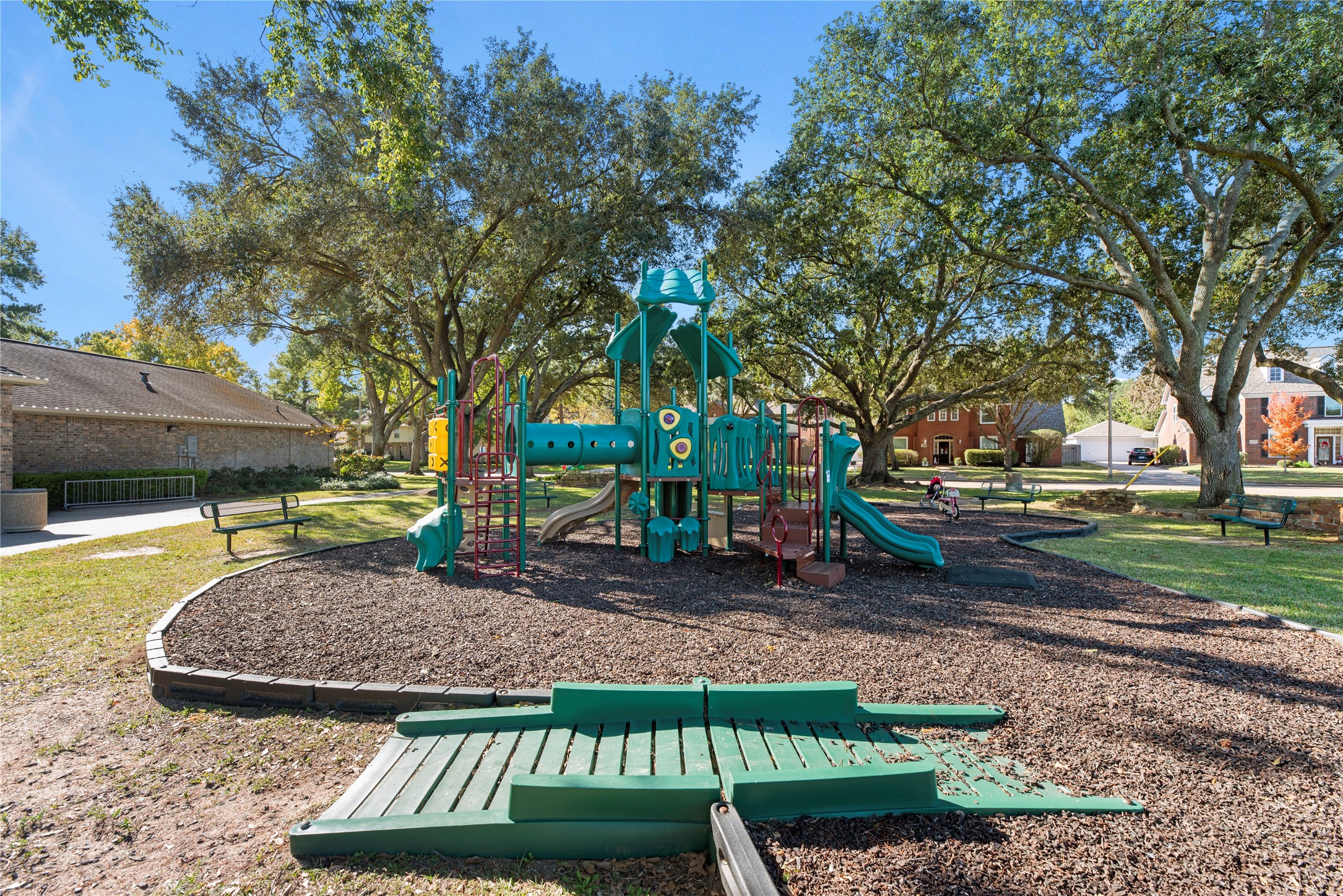This neighborhood playground offers plenty of space for little ones to climb, slide, explore & enjoy time outdoors under the shade of mature trees.