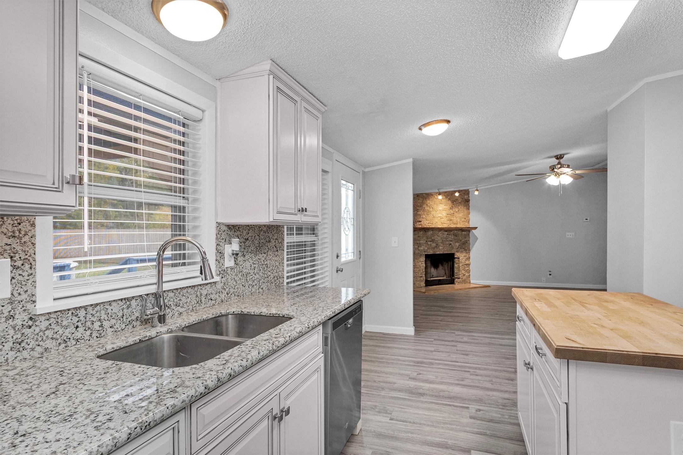 Open feeling to living and dining area with extra space for a breakfast nook