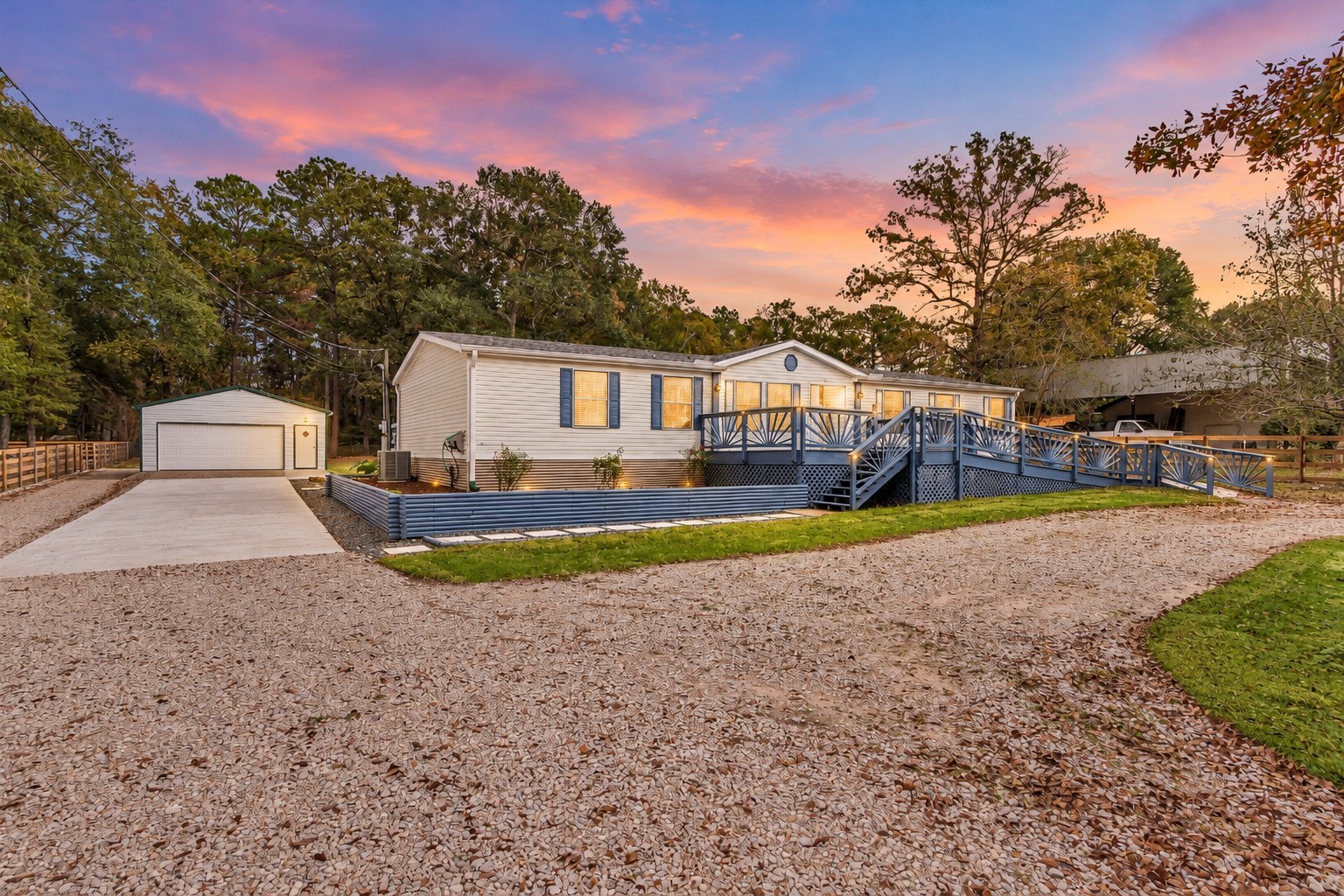 Welcome to 4621 Price Rd! Unrestricted land, a new garage and circle driveway with easy to maintain landscaping!