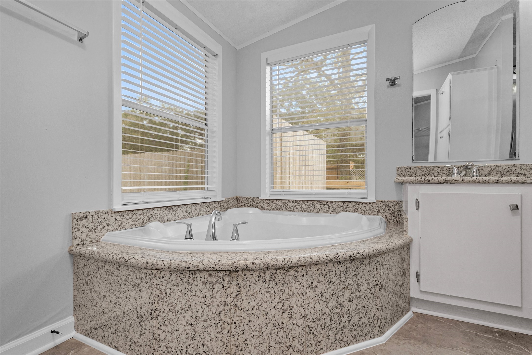 Garden tub for soaking, flooded with natural light