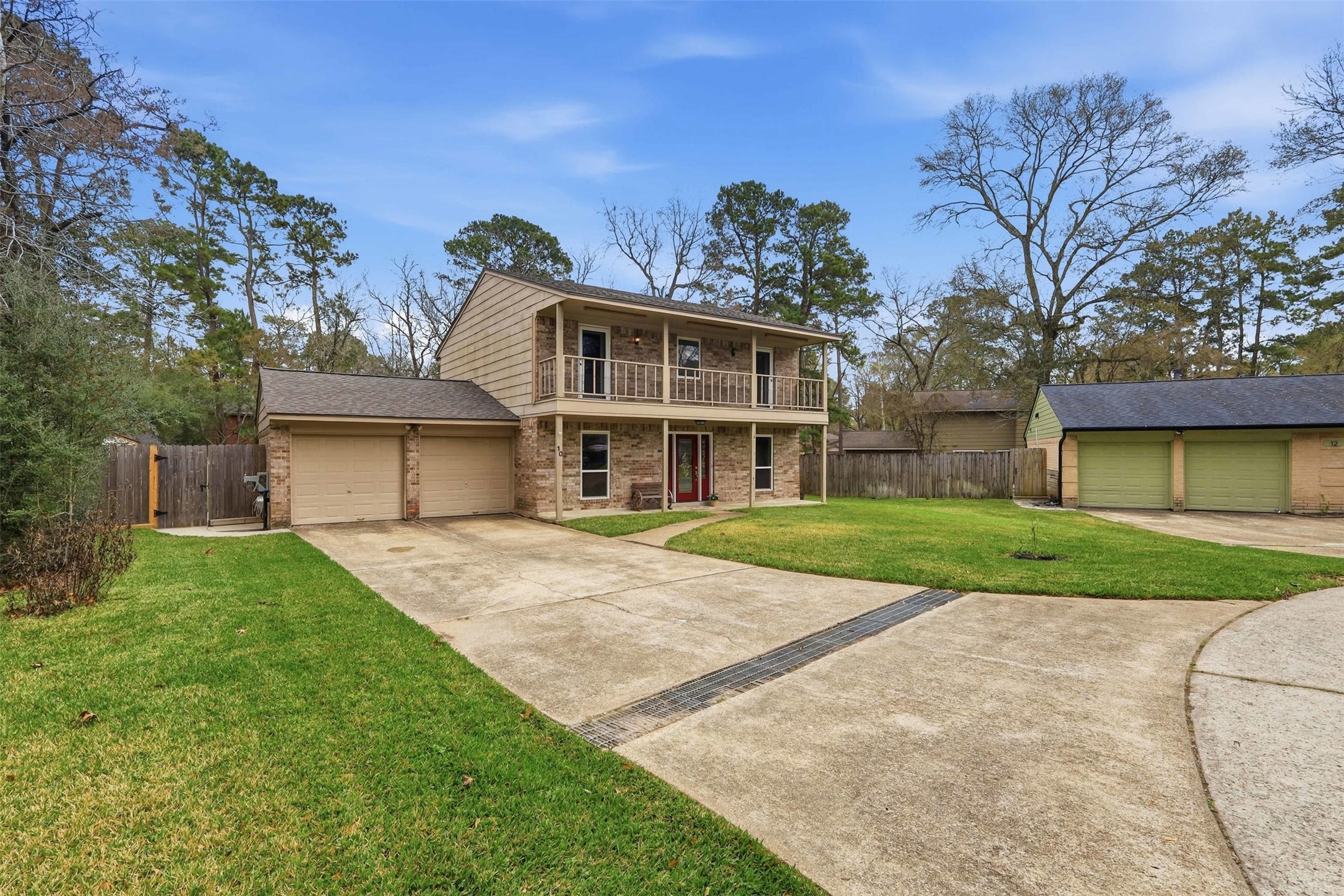 Spacious driveway and two car garage. Plenty of space for the whole family.