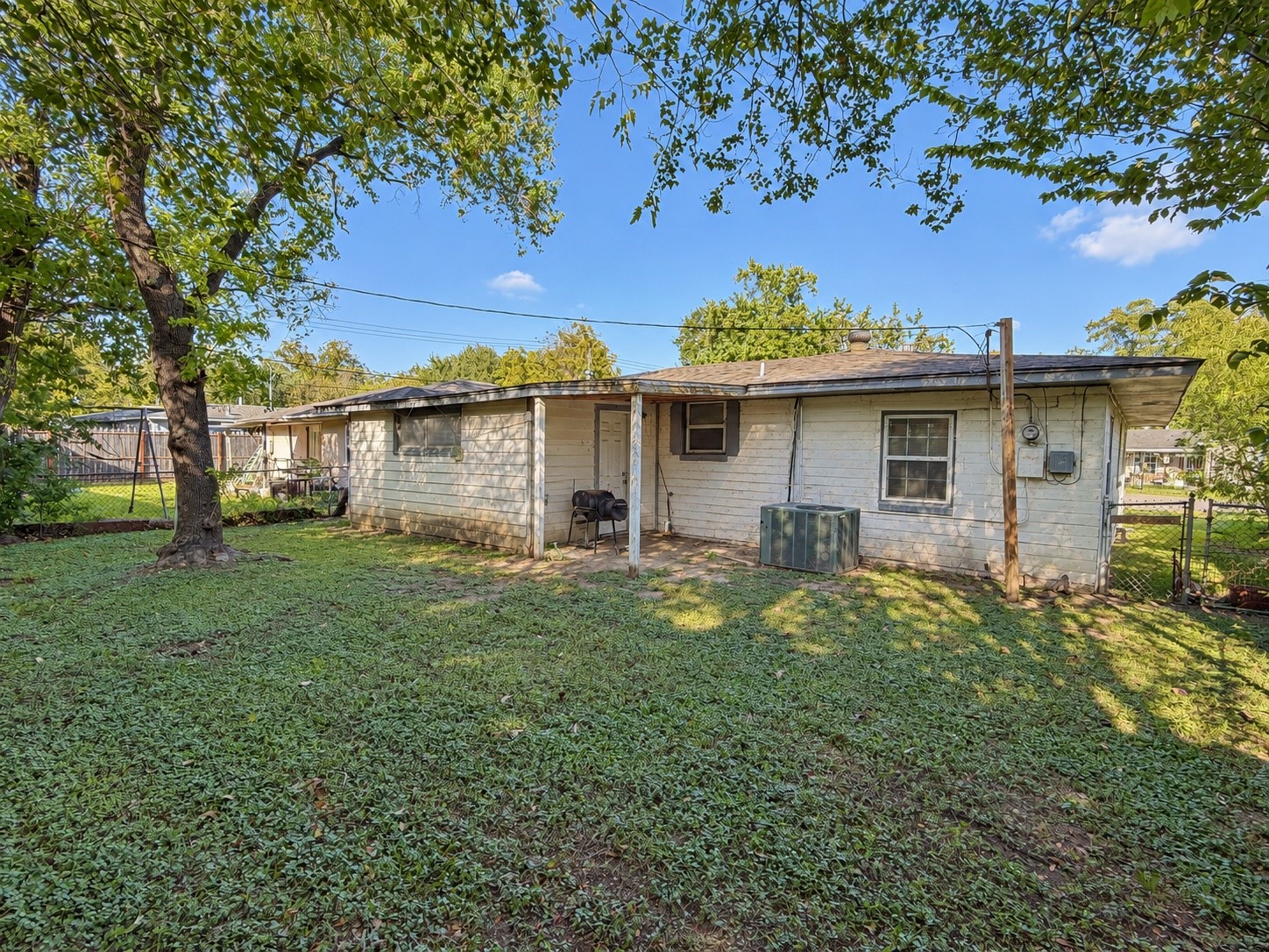 Backyard view toward the rear of the home, with lots of room to relax or entertain.