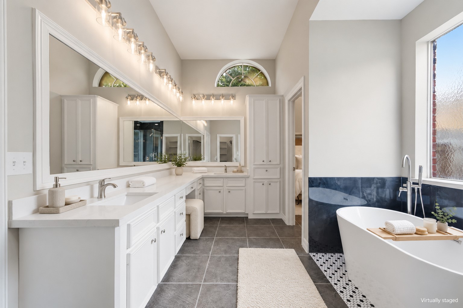 Virtually staged primary bath.