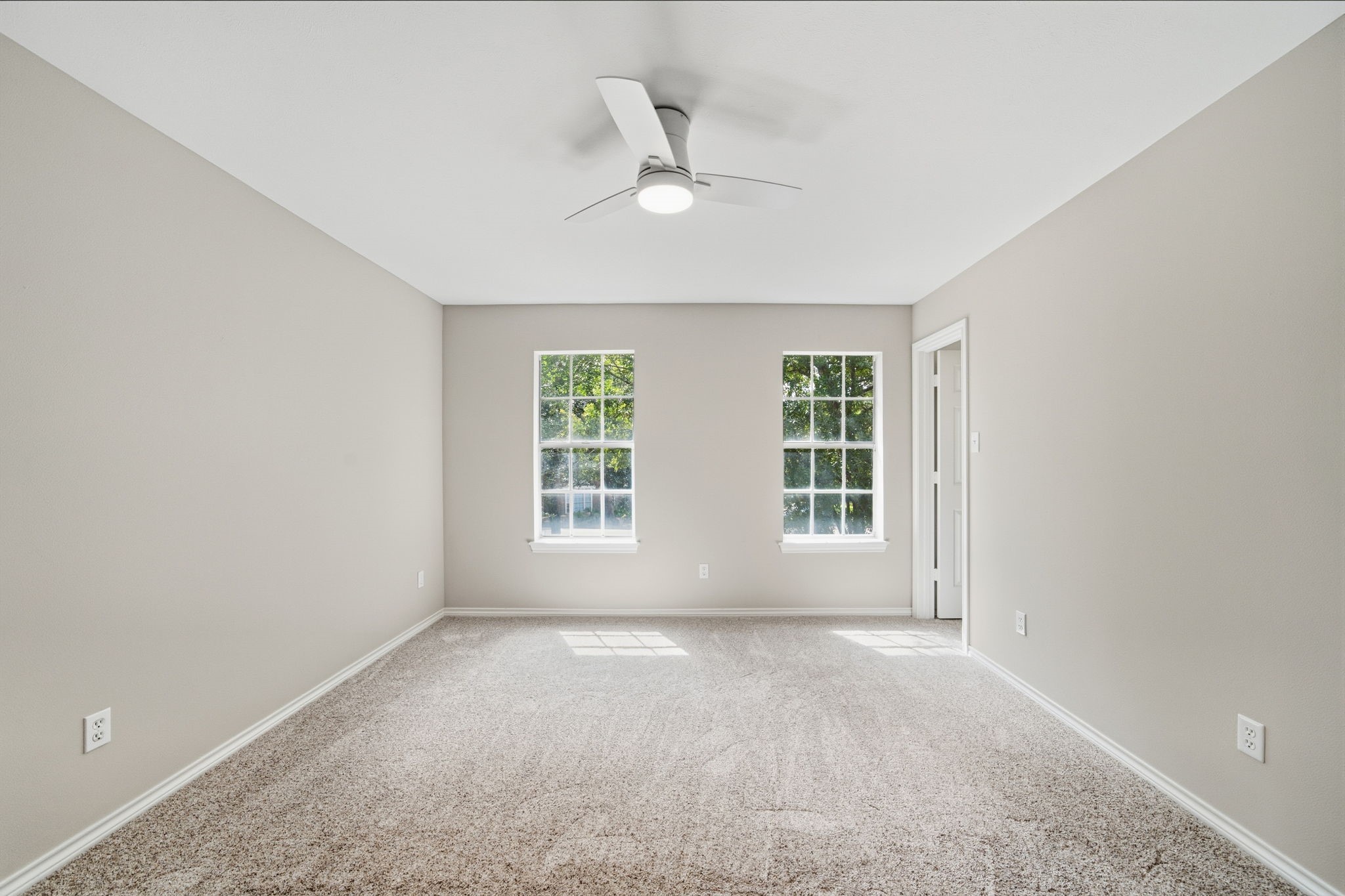 Three secondary bedrooms are located upstairs, creating wonderful separation between the primary suite and additional sleeping quarters.Each bedroom offers generous dimensions, nearby bath access, and walk in closet storage.