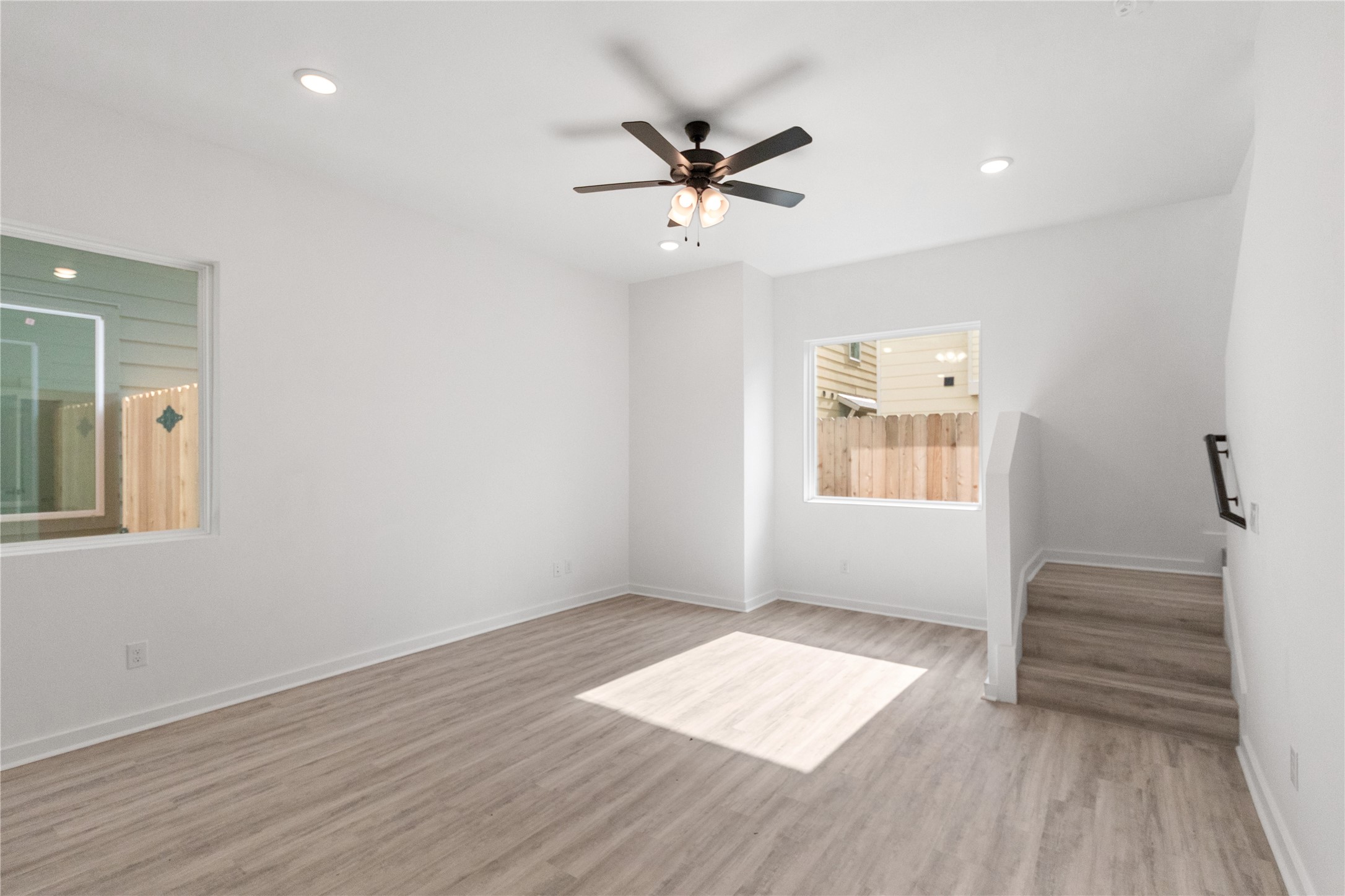 Open living area with area fan