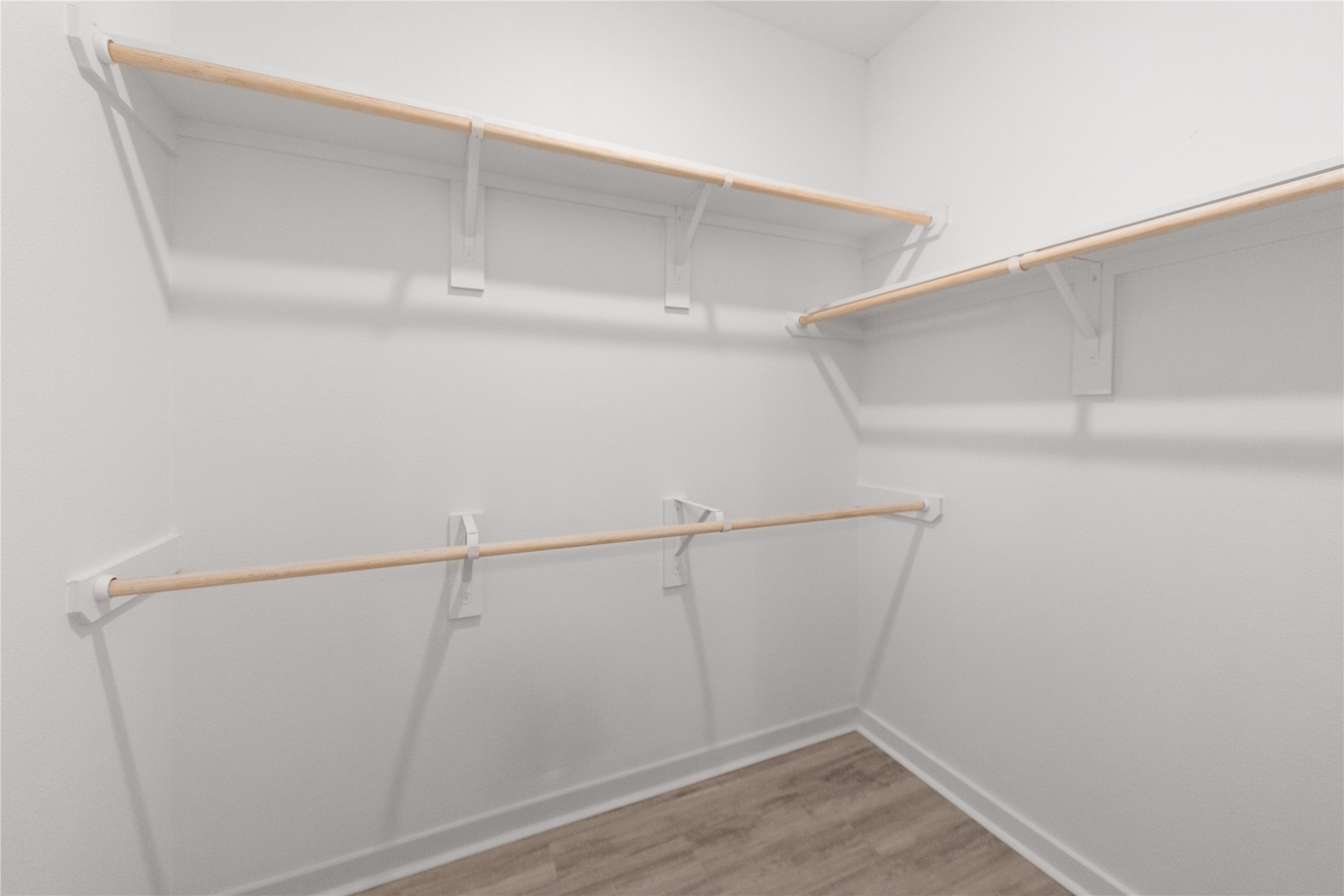 Walk-in closet with plenty of room for clothing