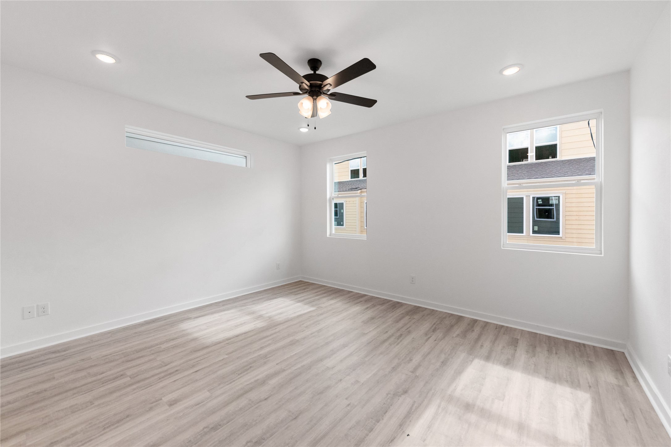 Primary has lev floors and area fan to keep cool