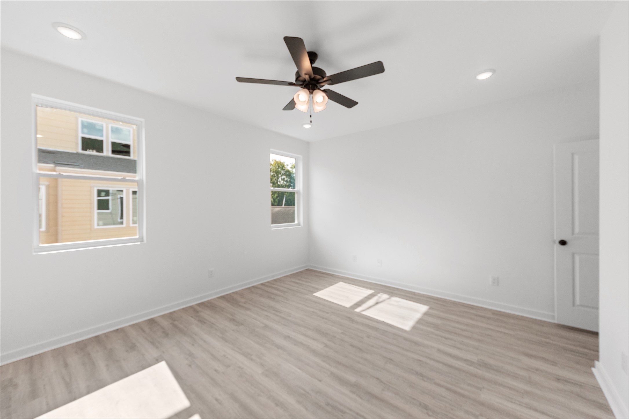 Primary bedroom with plenty of natural light