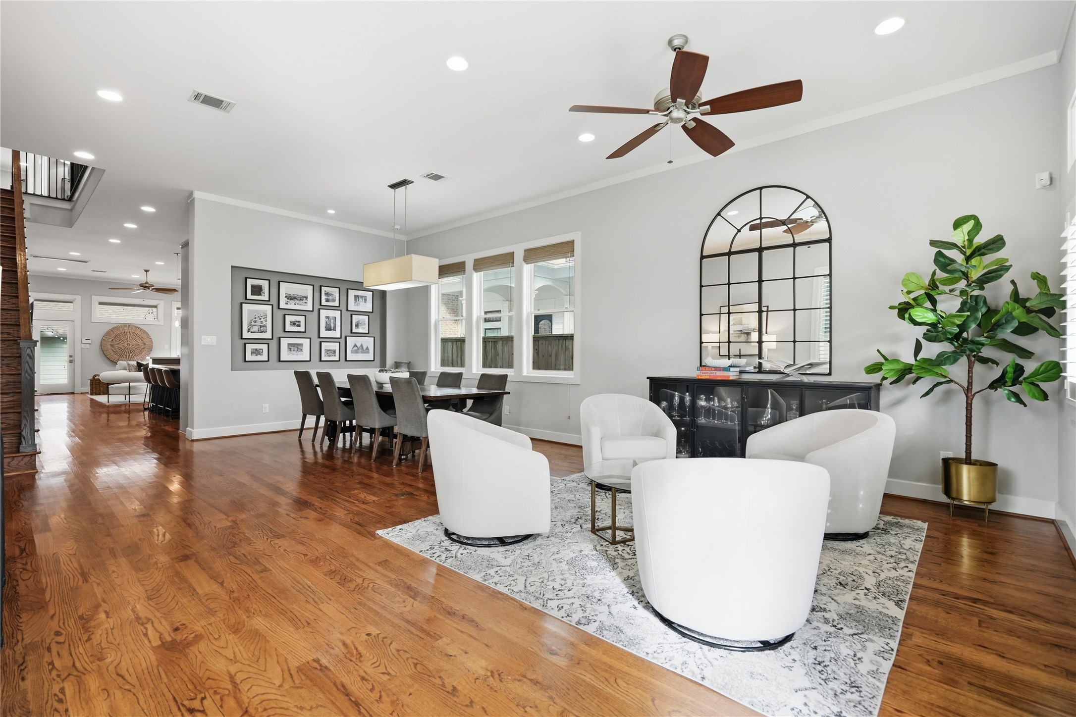 Upon entry, you're welcomed by a spacious conversation area, creating the perfect setting for entertaining guests or enjoying everyday living.