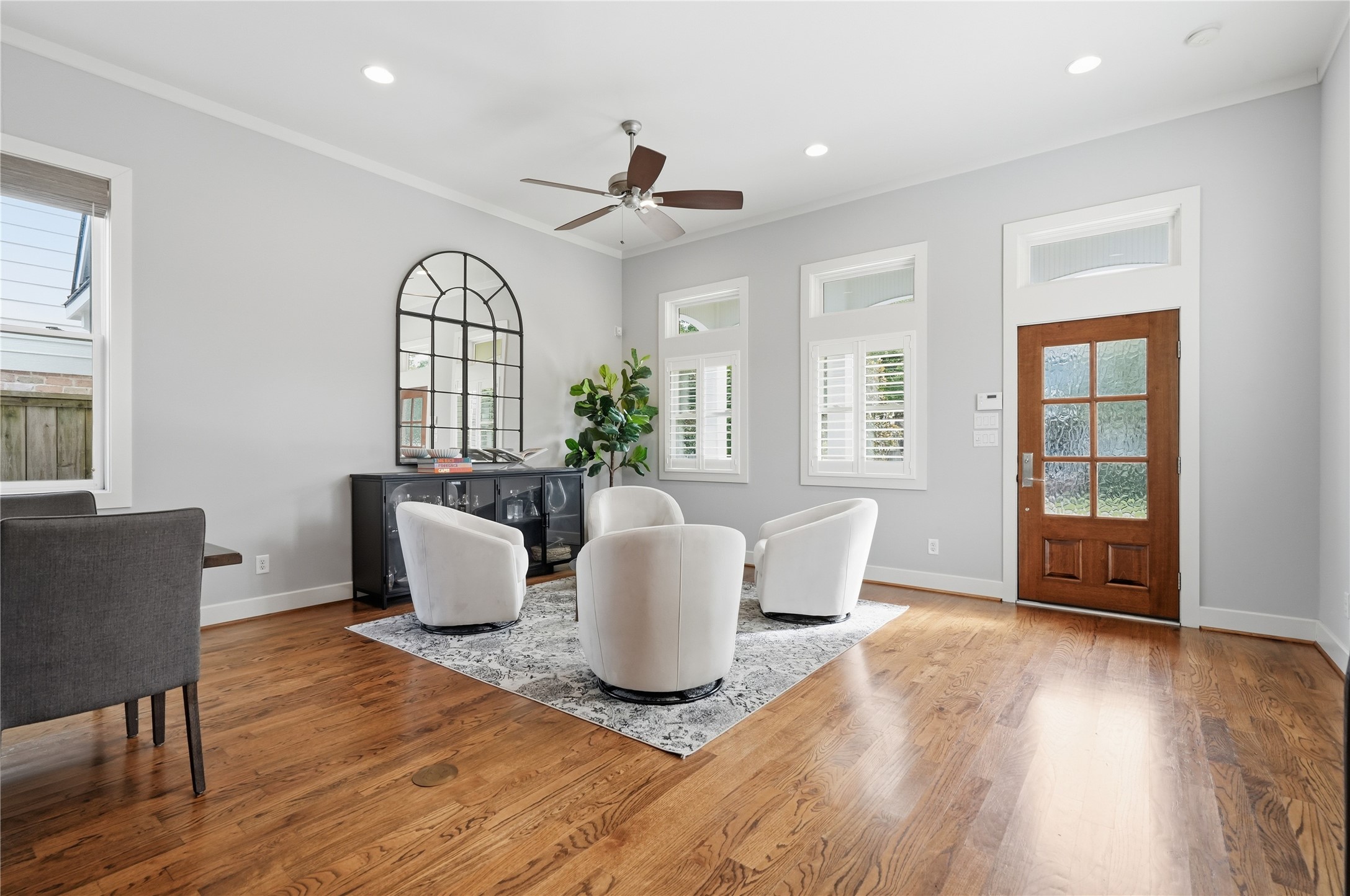 A dedicated conversation area adds charm and versatility, creating the perfect setting for intimate gatherings and relaxed evenings at home.