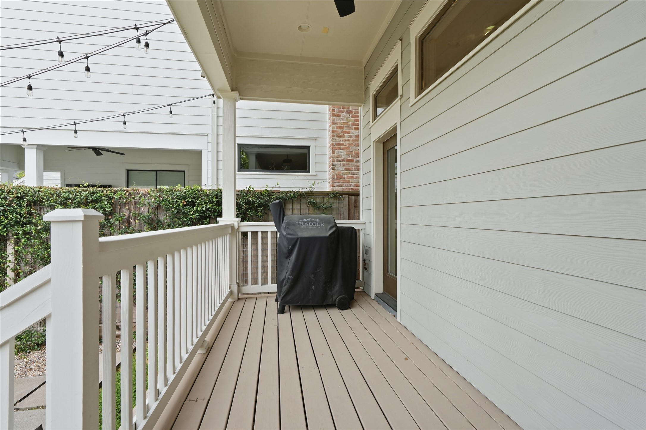 Covered patio space perfect for year-round grilling and entertaining.