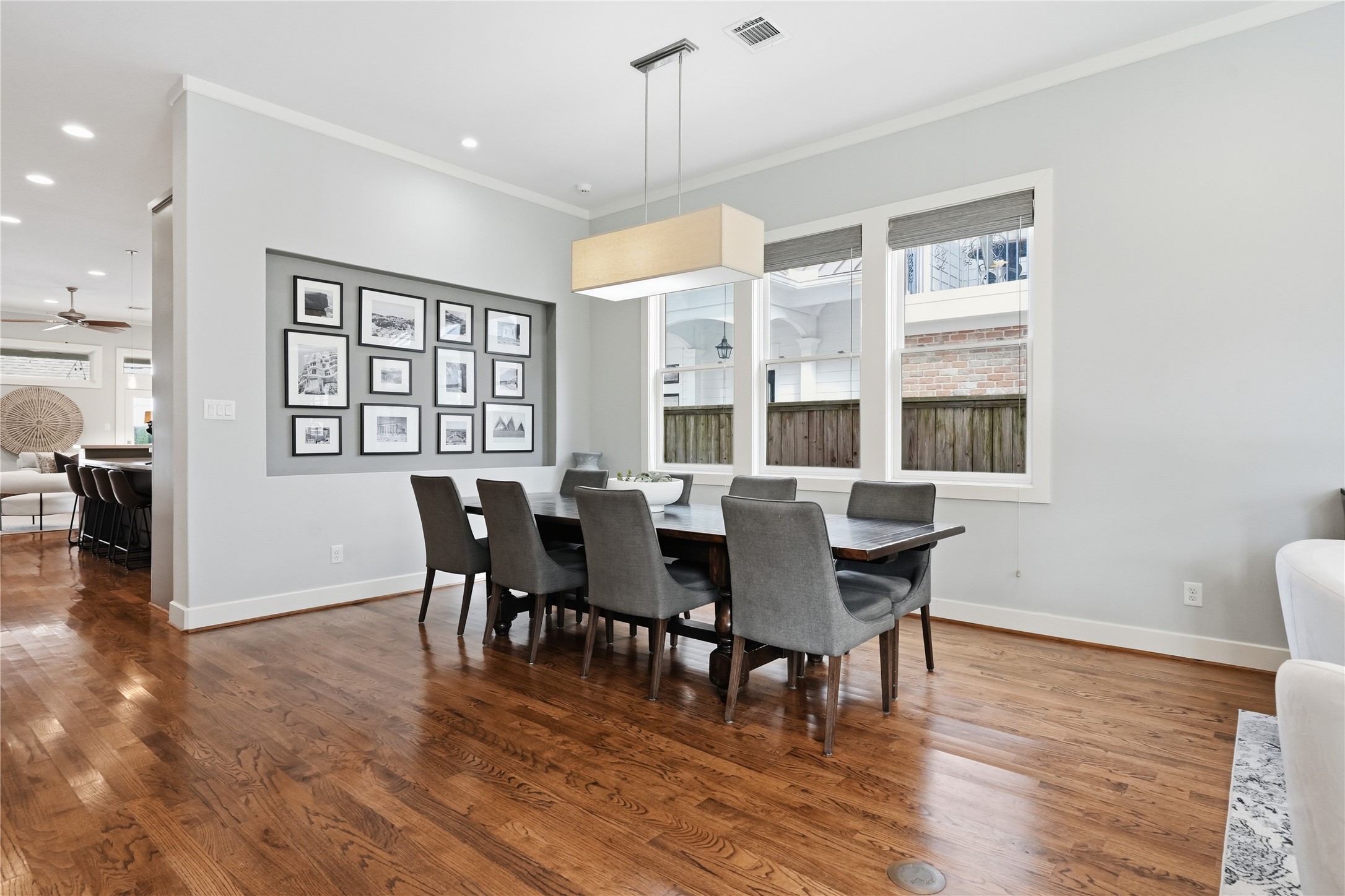 Spacious dining area offers ample seating and seamless flow to the kitchen and living spaces, making entertaining effortless.