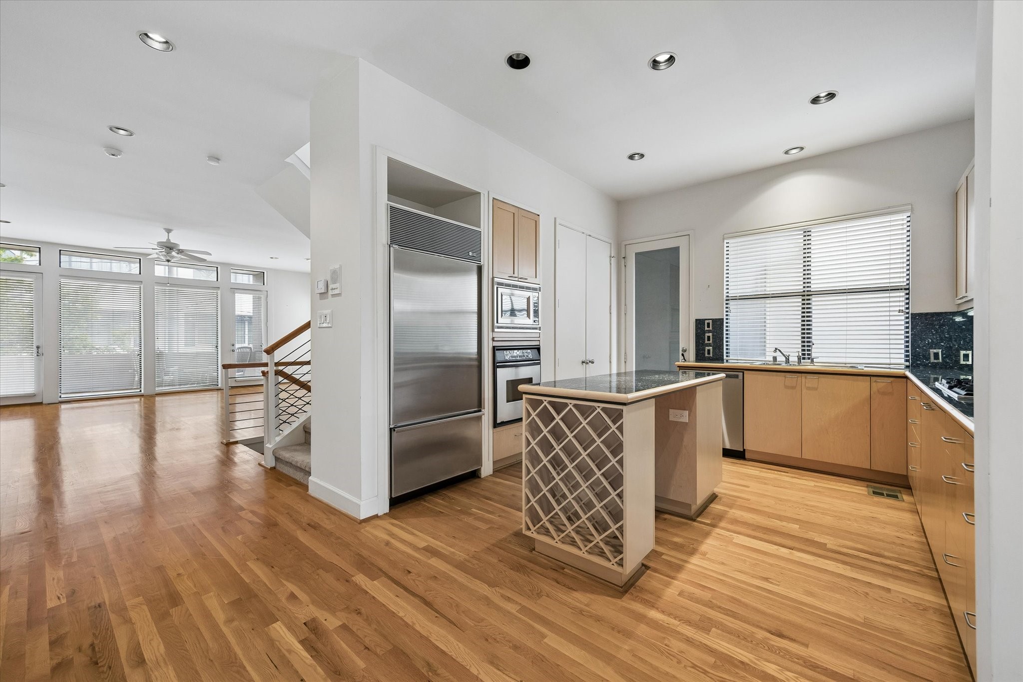 IT IS ALL HERE, SUB ZERO, AND 5 GAS BURNER COOKTOP.  LOVE THE INVITING FEELING THIS HOME HAS, WE ALL LOVE TO BE IN THE KITCHEN.  THIS ONE HAS A BALCONY,  PERFECT.