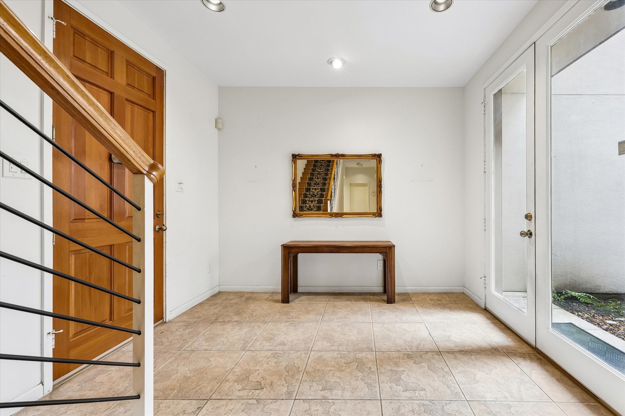 ANOTHER VIEW OF THE SPACIOUS ENTRY.