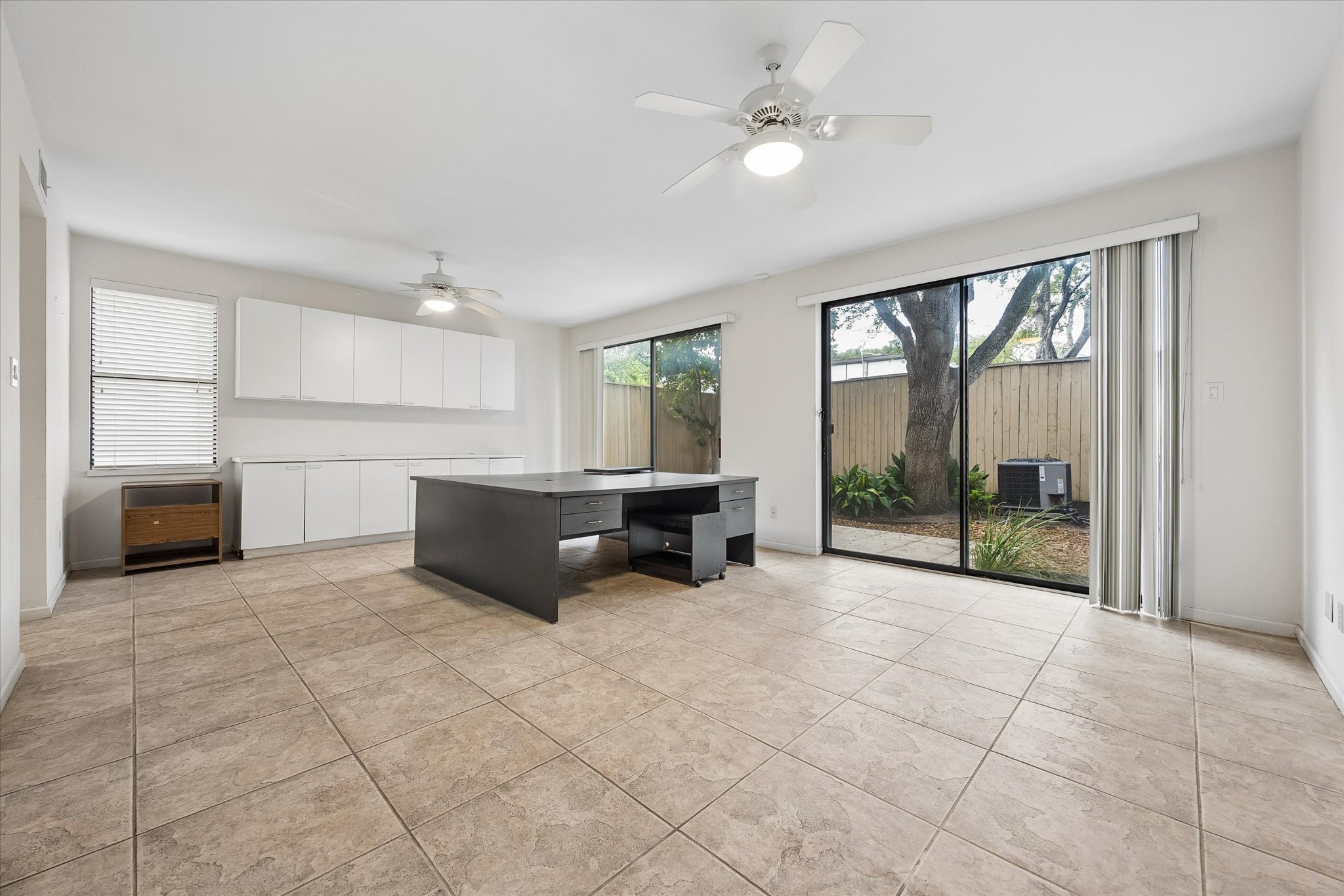 BEYOND SPACE IS THIS MASSIVE OFFICE WHICH CAN BE CONVERTED INTO 2 BEDROOMS, THERE ARE 2 FULL BATHS WITH TUB AND SHOWERS ON EACH SIDE WITH 2 CLOSETS, ON EACH SIDE.